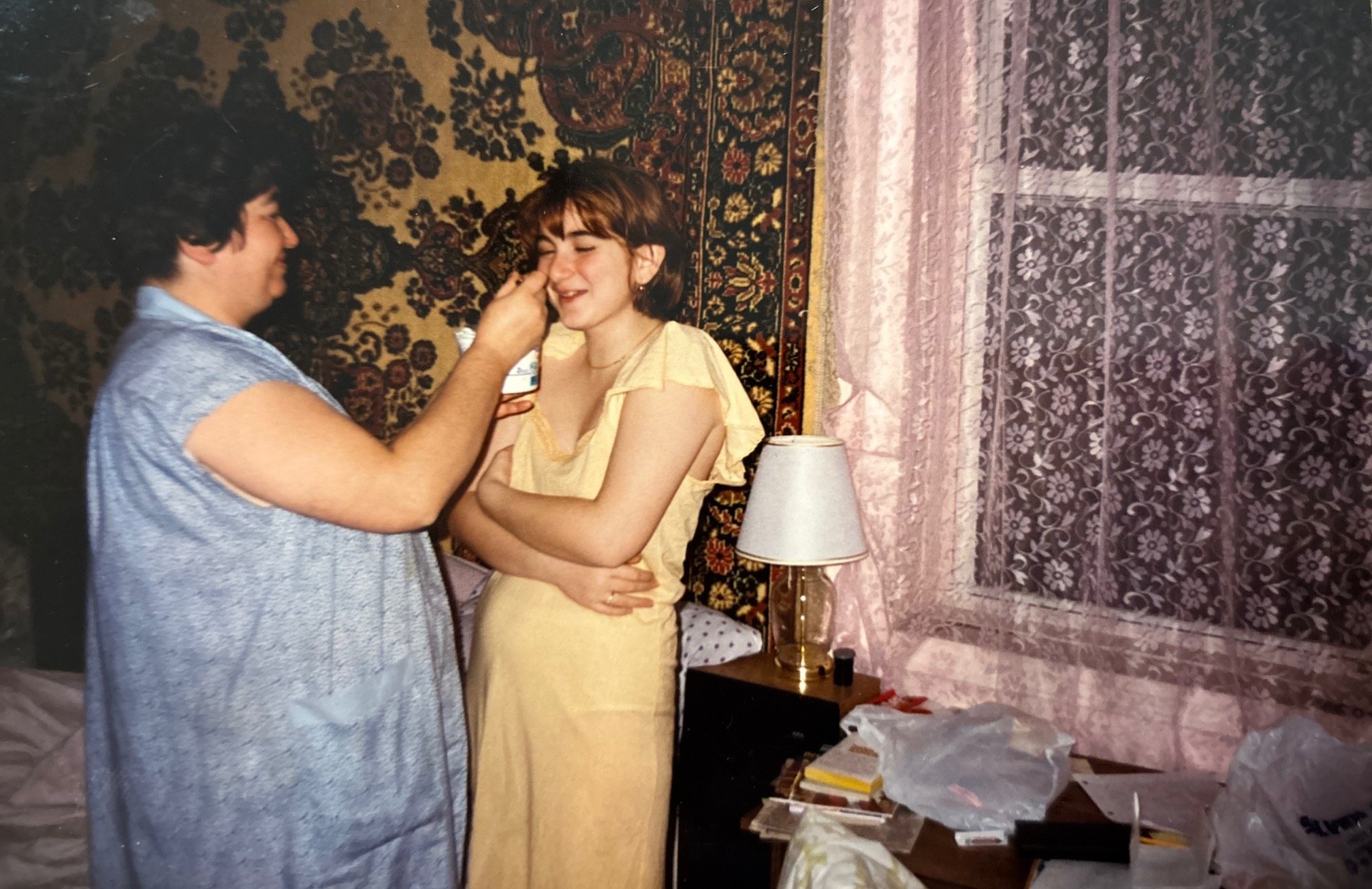    Mom feeding me American sour cream at bedtime. 1994   