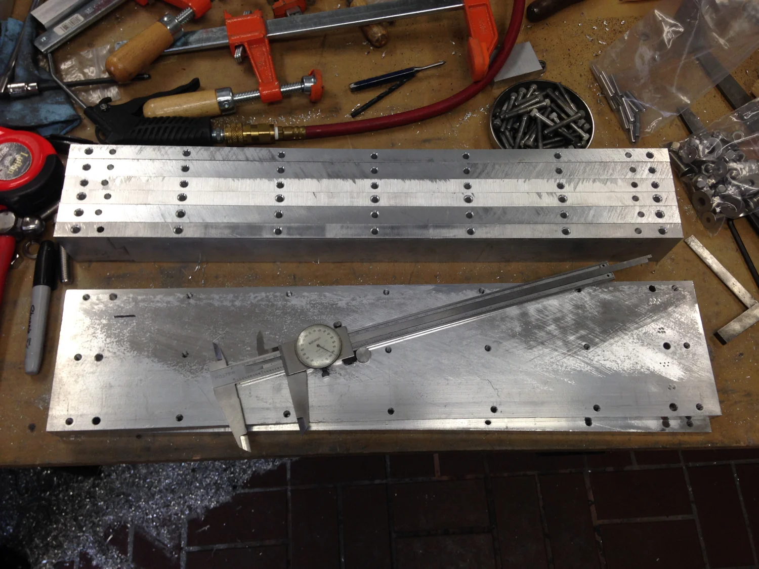 Since we couldn't use billet, the sides had to be pinned and screwed to the base plate so they couldn't shift.