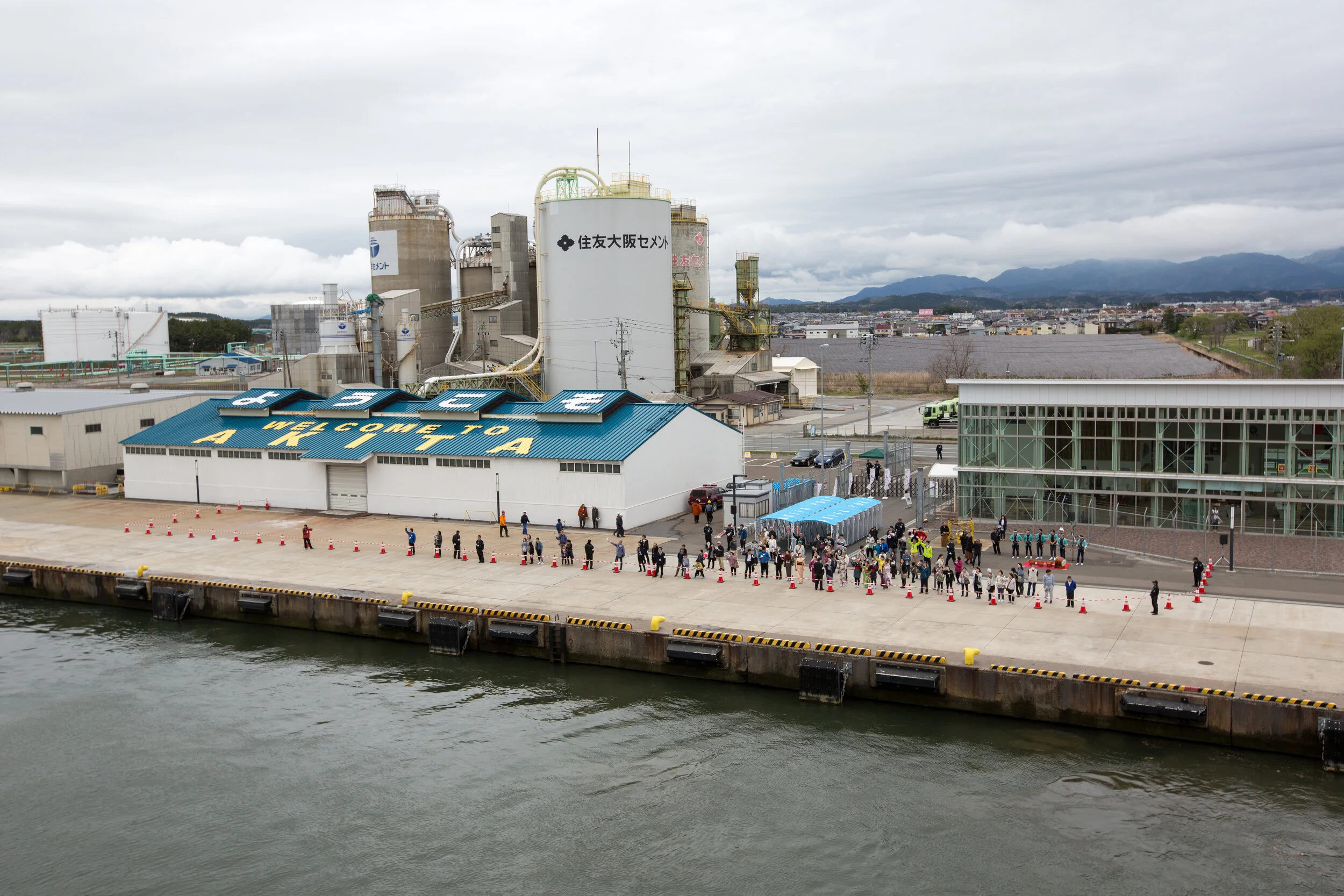Casting off and leaving our hosts on the dock at Akita, Japan.