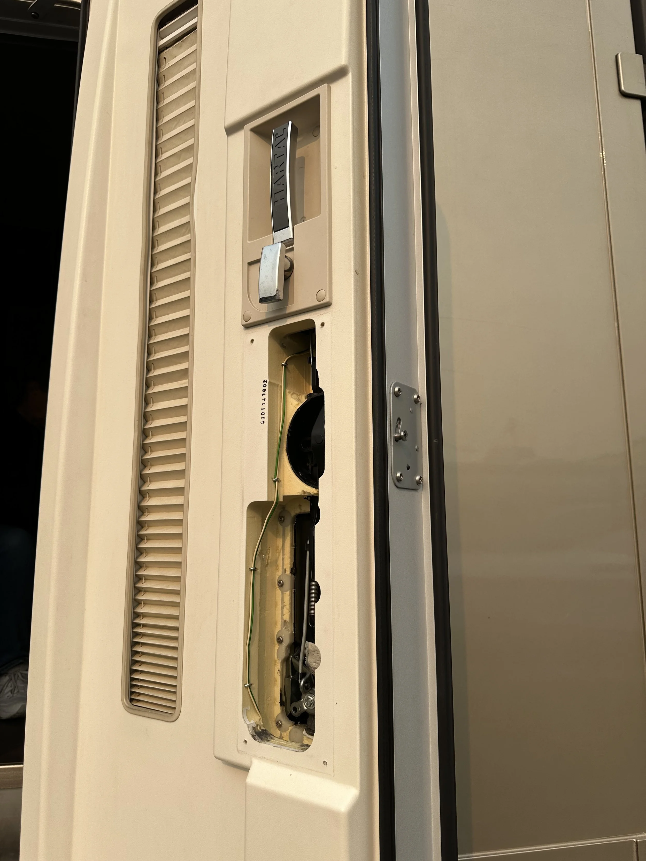   The inside cover had to be removed to determine what caused the door opener mechanism to fail.  