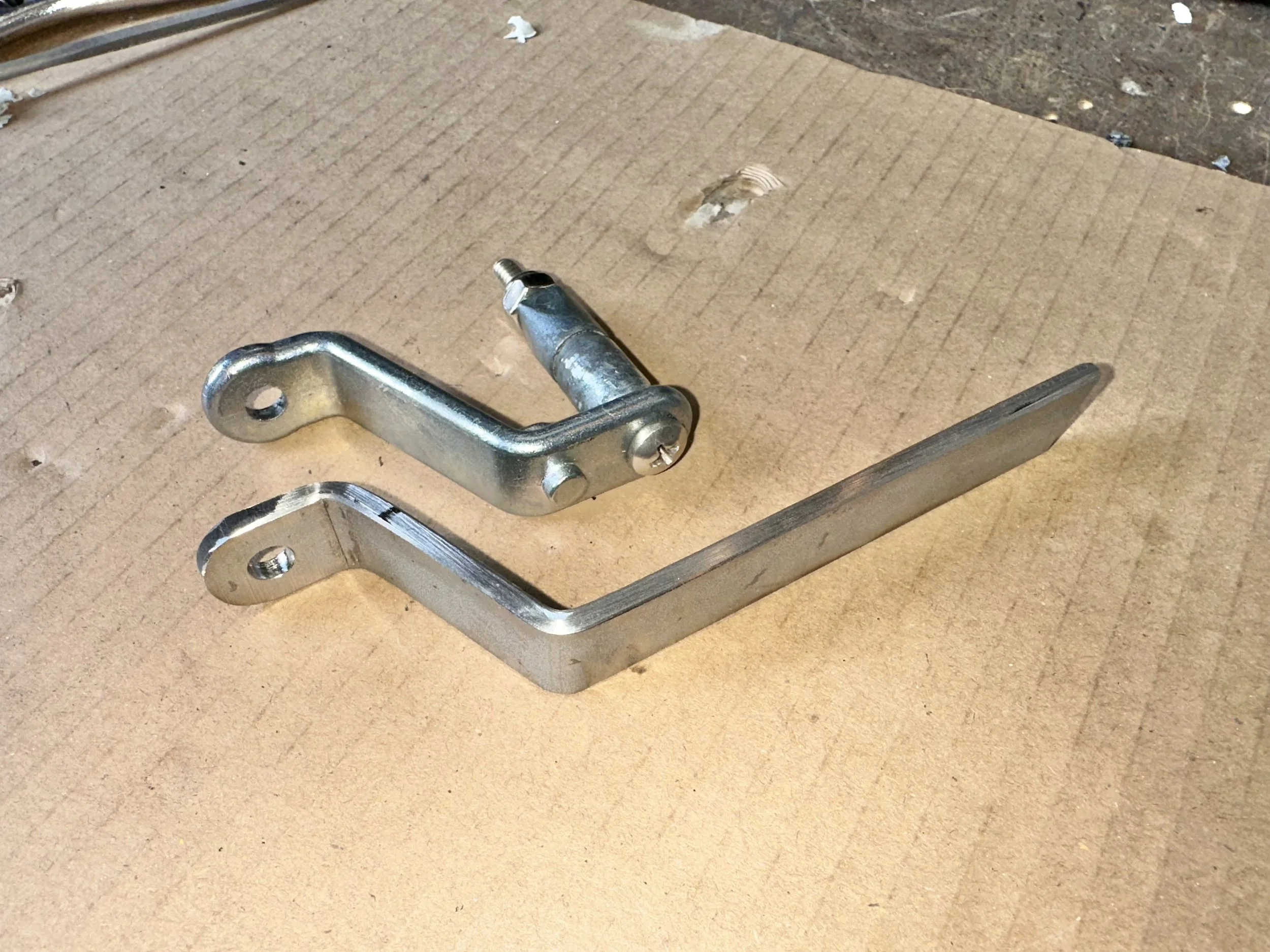   The first step was to create the flatbar portion, which was done by bending 1/8” thick material in the bench vice with a heavy hammer.  