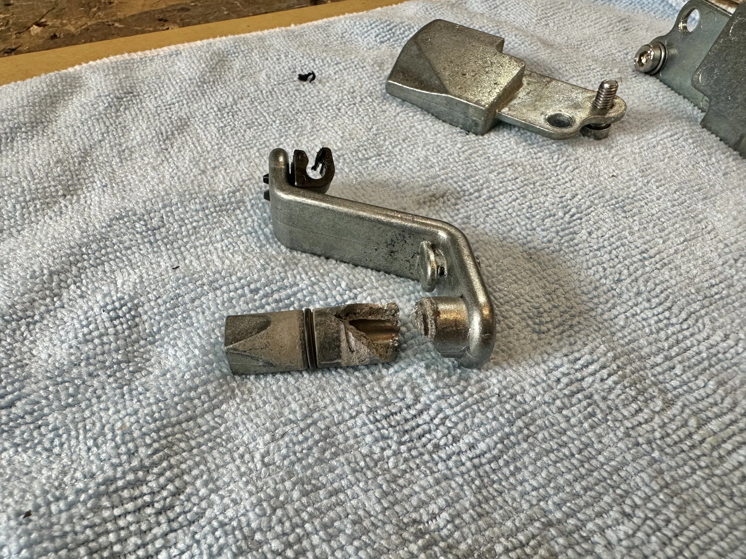  This is the broken part that must be replaced. But since I can’t easily get the part, I decided to remake it myself in stainless steel. This part is some kind of cast metal that can’t be welded.    