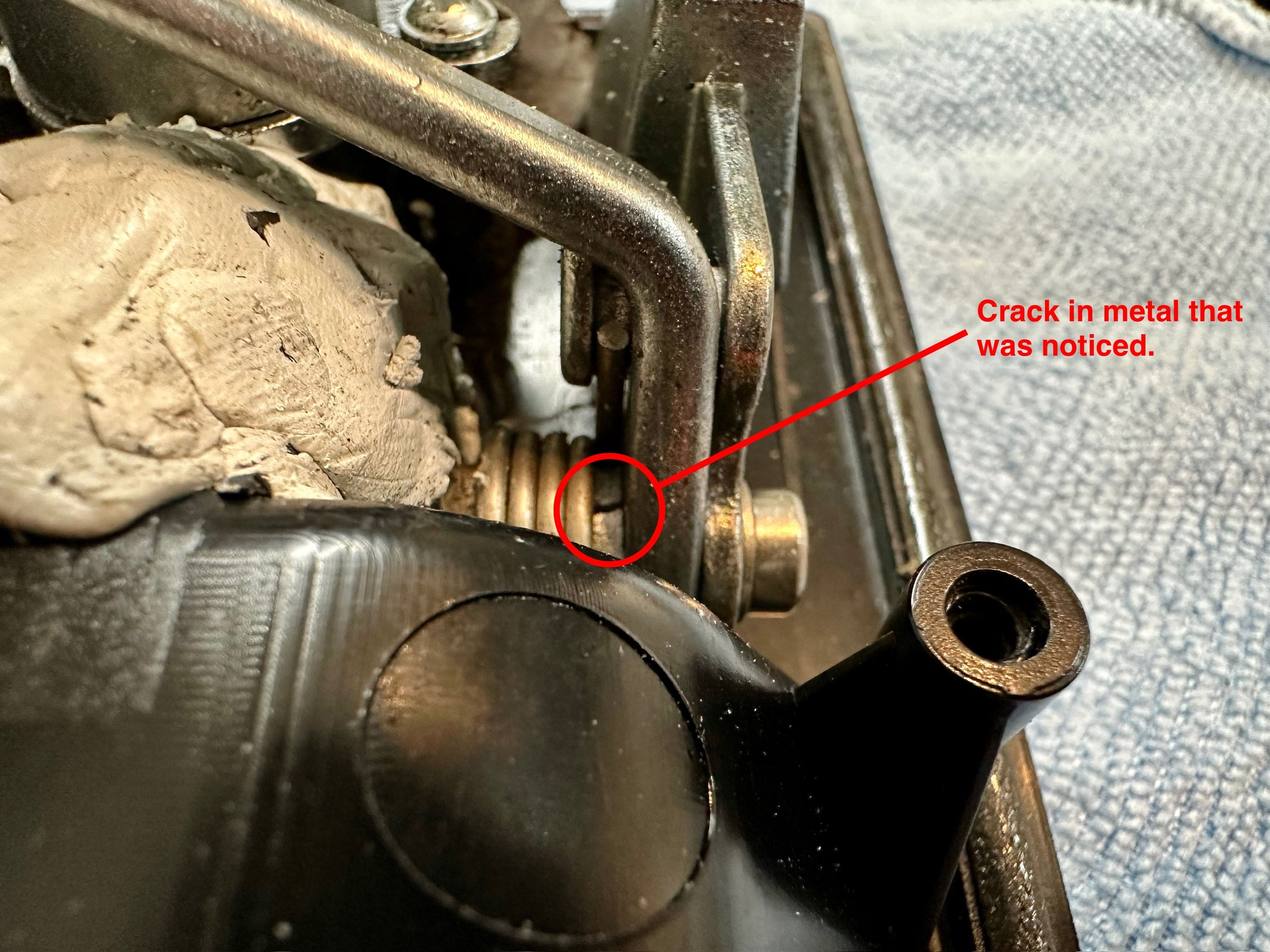   The pivot axle that connects the latch lifting bar to the outside door handle is broken.  