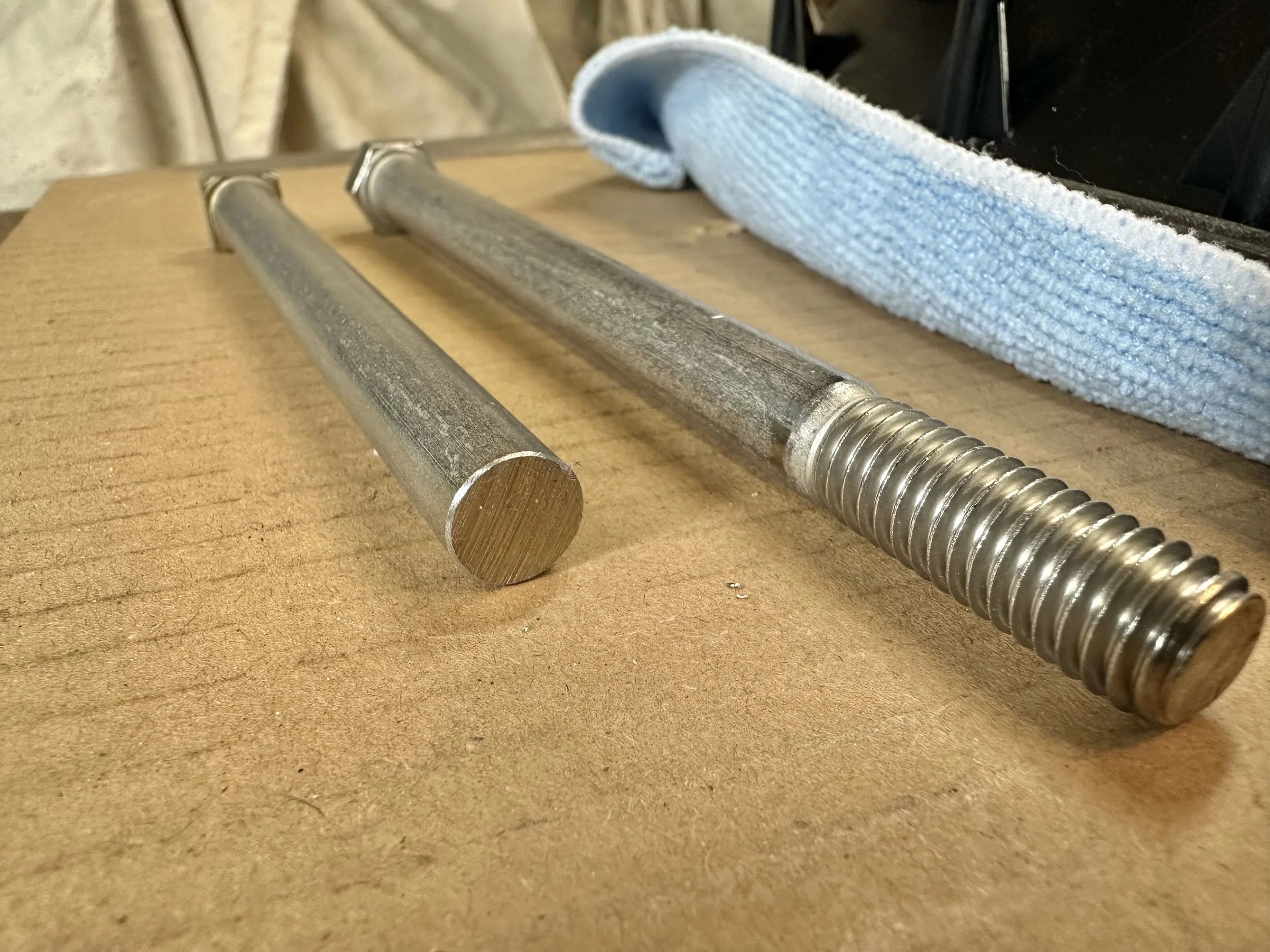   I got two of them in case my first try didn’t work. The threaded section was cut off with a hacksaw and then the end ground flat on the disk sander.  