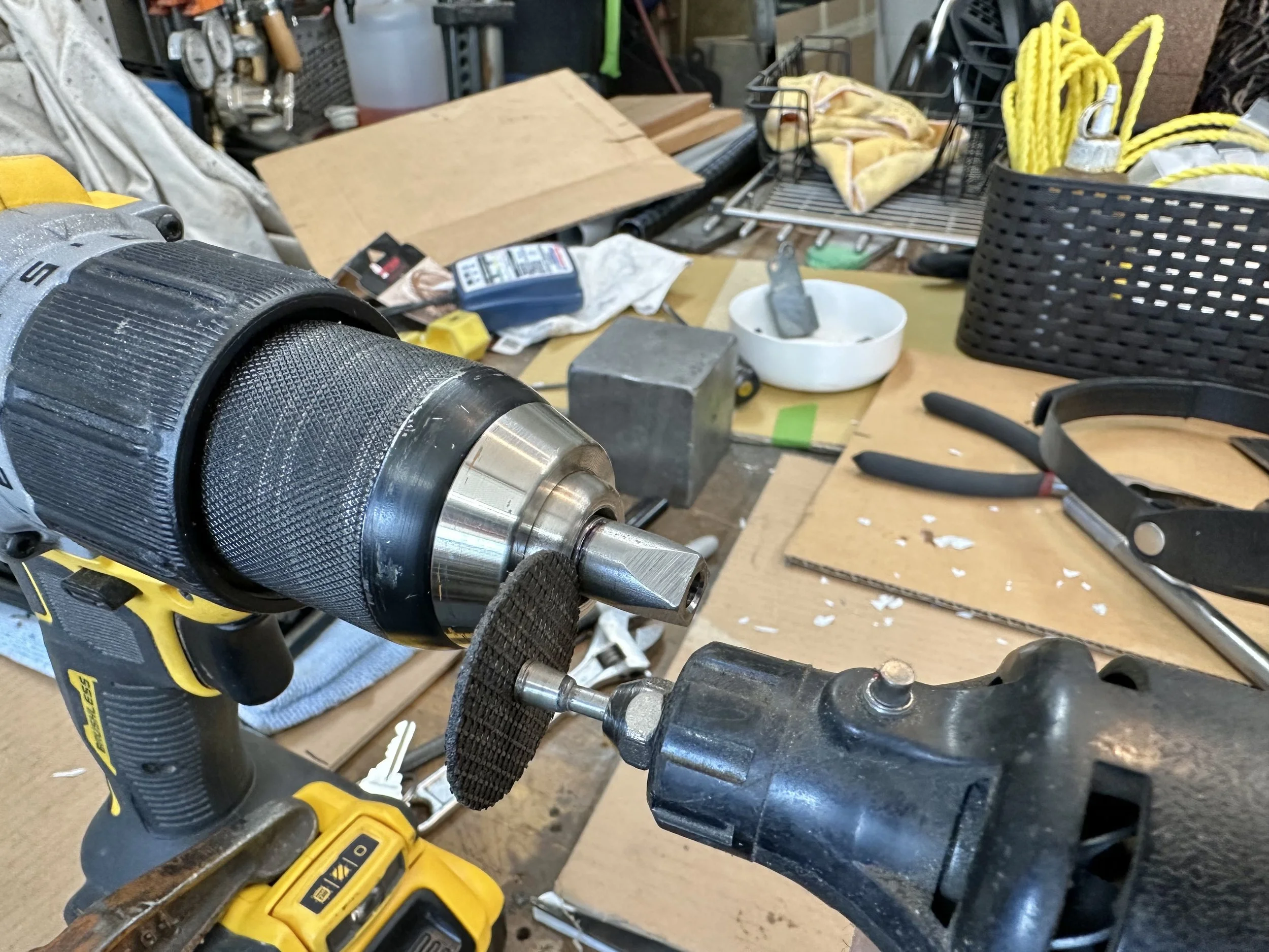   The shaft has a groove for an o-ring seal. So I used a hand drill to spin the shaft while an abrasive disk in a Dremil tool was used to grind in the groove.  