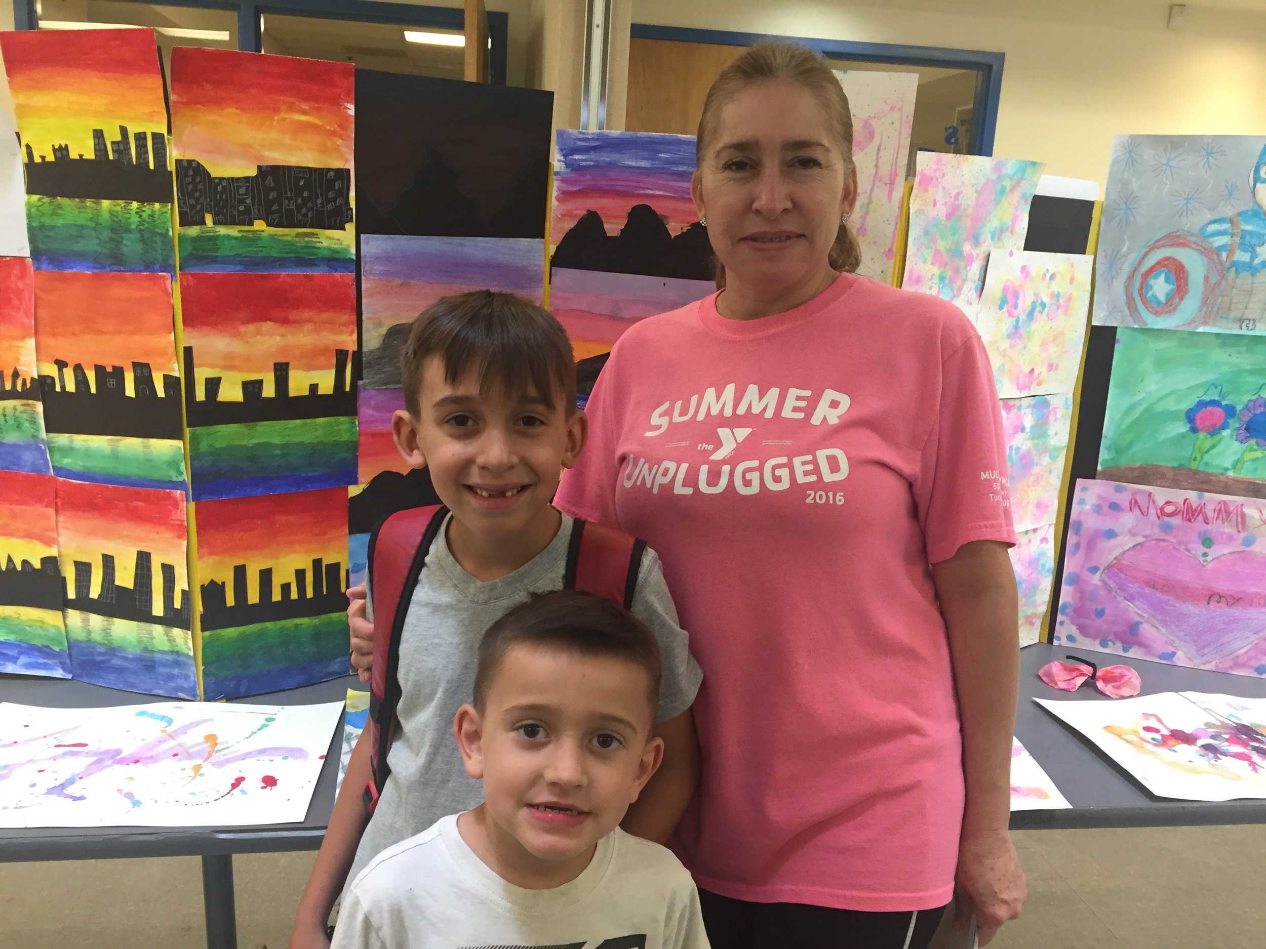 Volunteer and children at YMCA summer art program in Tucson, Arizona