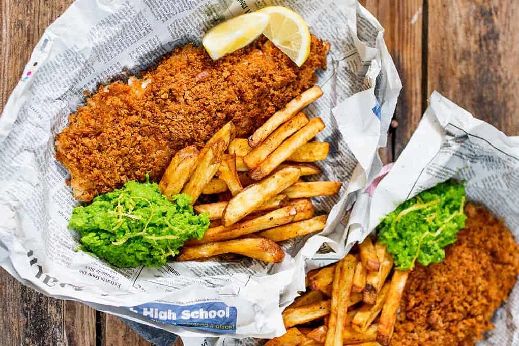 Baked-fish-and-chips-with-lemon-smashed-peas-recipe-tall.jpg
