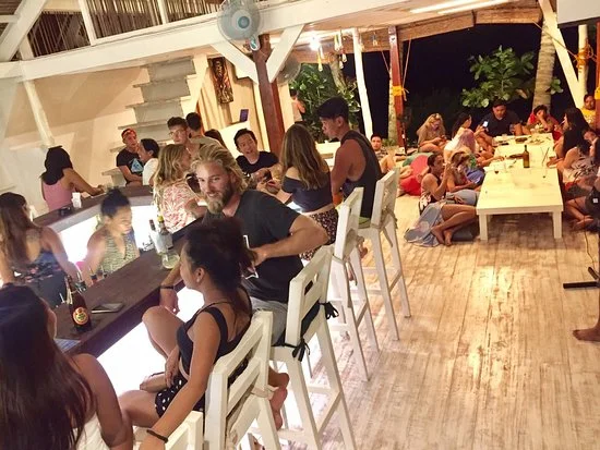 Customers enjoying a busy night at White Banana