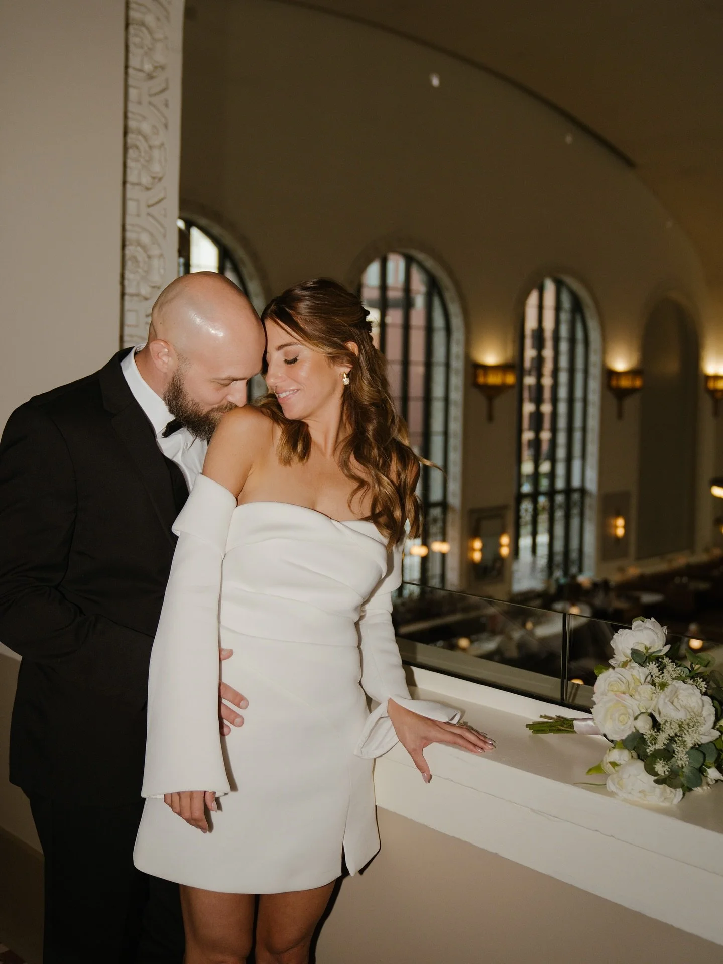 Started with their ceremony outside a courthouse (with their dog as their witness) and ended up at Union Station. Took a little stop at Ball Arena, too, with their cute wedding jerseys!! Such a fun day.