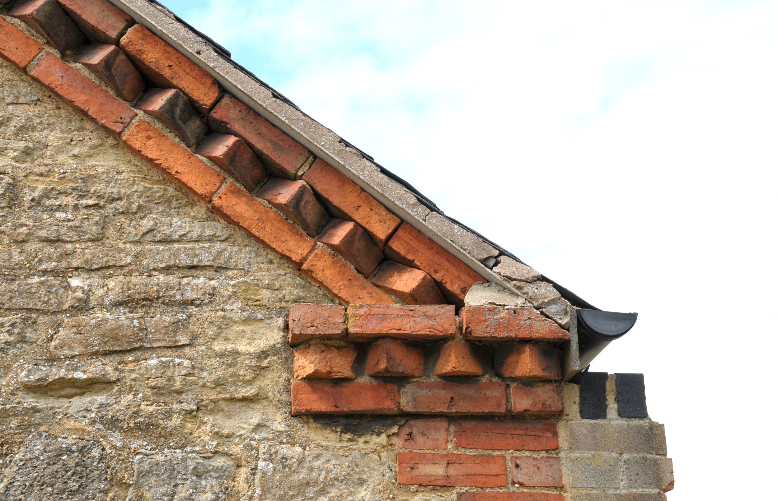 Albion Archaeology project. Dogtooth brickwork on roof gable, Carlton, July 2015