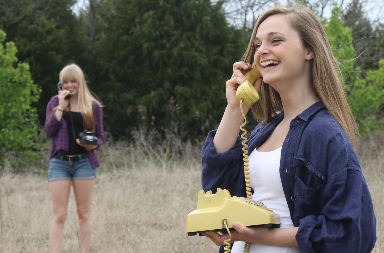 girls on phone.jpeg