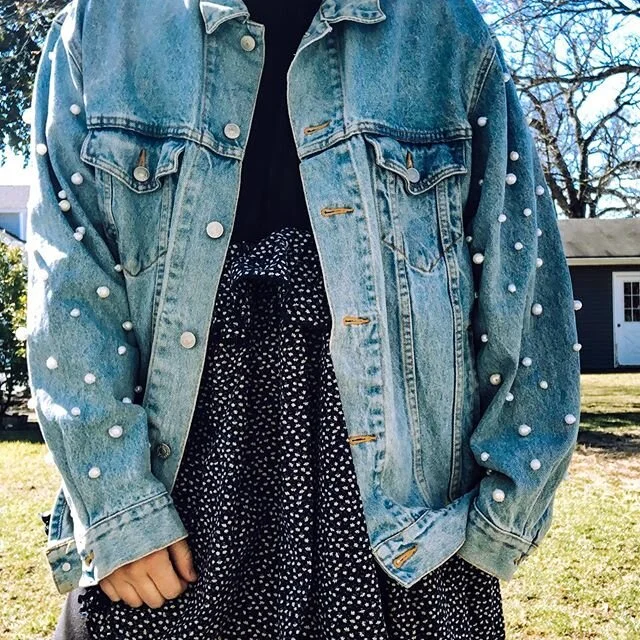 PEARLS GO WITH EVERYTHING ✨ including your rent the runway clothes that you have nowhere to wear now 😂 social distancing in style in a #handbeaded vintage @calvinklein denim jacket