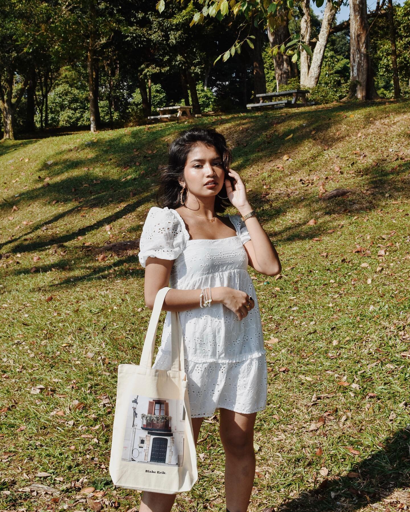 Prefer the size and shape of the classic tote?

These in comparison to the zip totes have a longer strap, and are still great essentials to have for the everyday routine.

In frame, Amaliya carries the Coastal Summer Towns of Spain Tote Bag, which yo