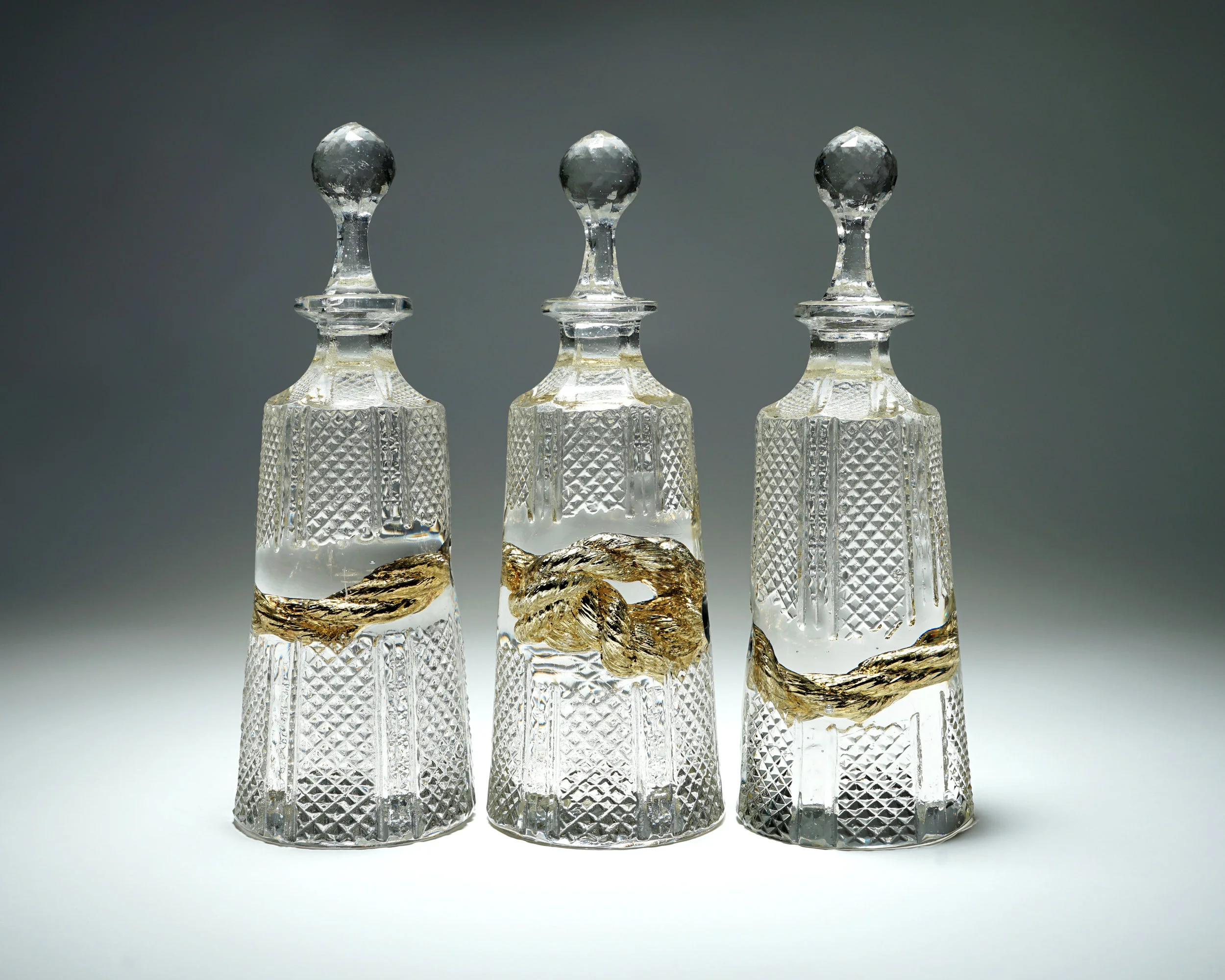 ‘The Golden Thread’ (Hex Decanters), 2019, Cast Crystal / 24 Carat Gold Mirror, 11h x 11w x 3.50d in