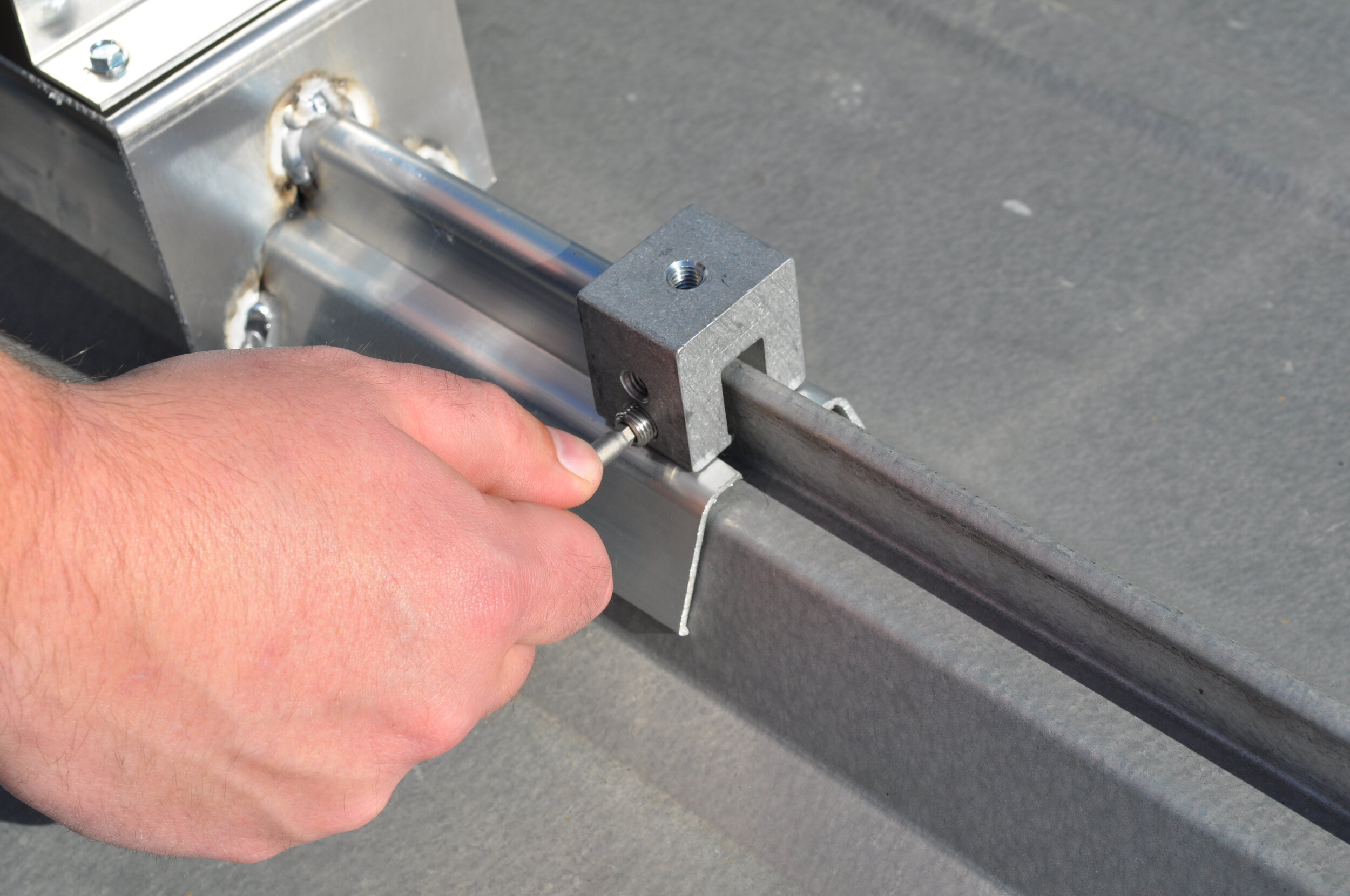 10 Use S-5! clamp to secure to Roof Panel.jpg
