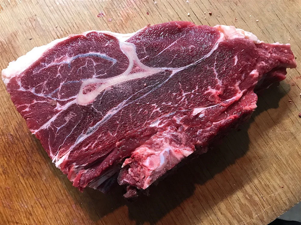 This cut of meat is from a bred Heritage Shorthorn heifer that went to emergency slaughter due to a severe injury. Notice the marbling quality from this heifer which had not been on a “finishing ration”—she had never had grain.