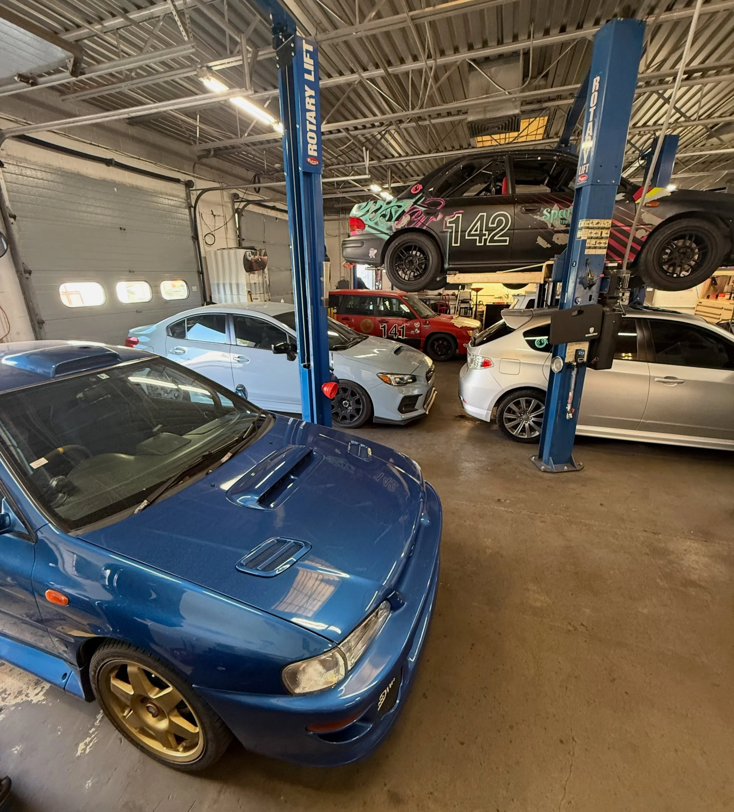 Putting cars away for the night, Sparky&rsquo;s is looking like a Subaru dream garage. #gc8 #typeRA #sf5 #slammedVA #GRhatch
