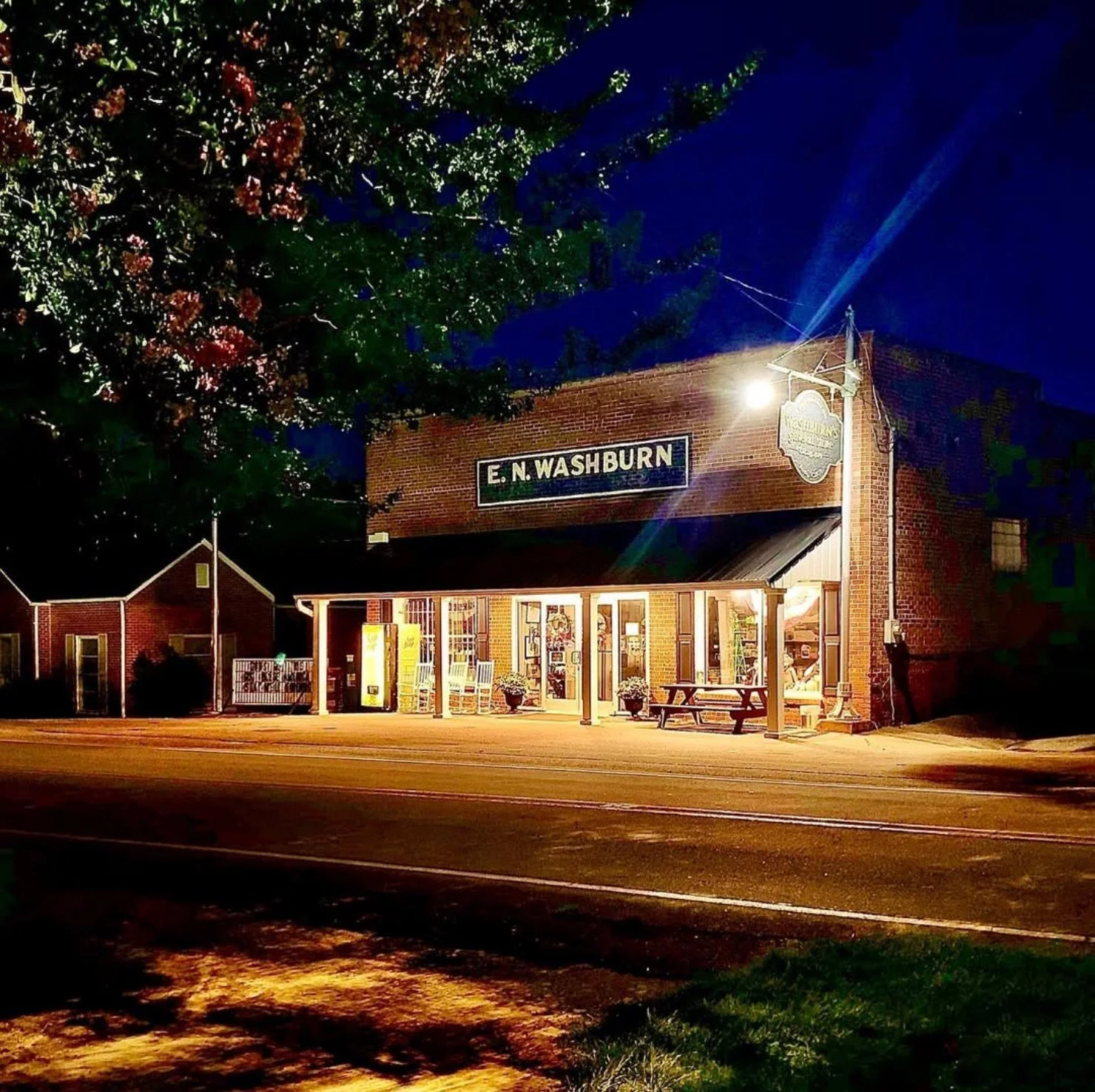 Washburn's General Store lit up at night