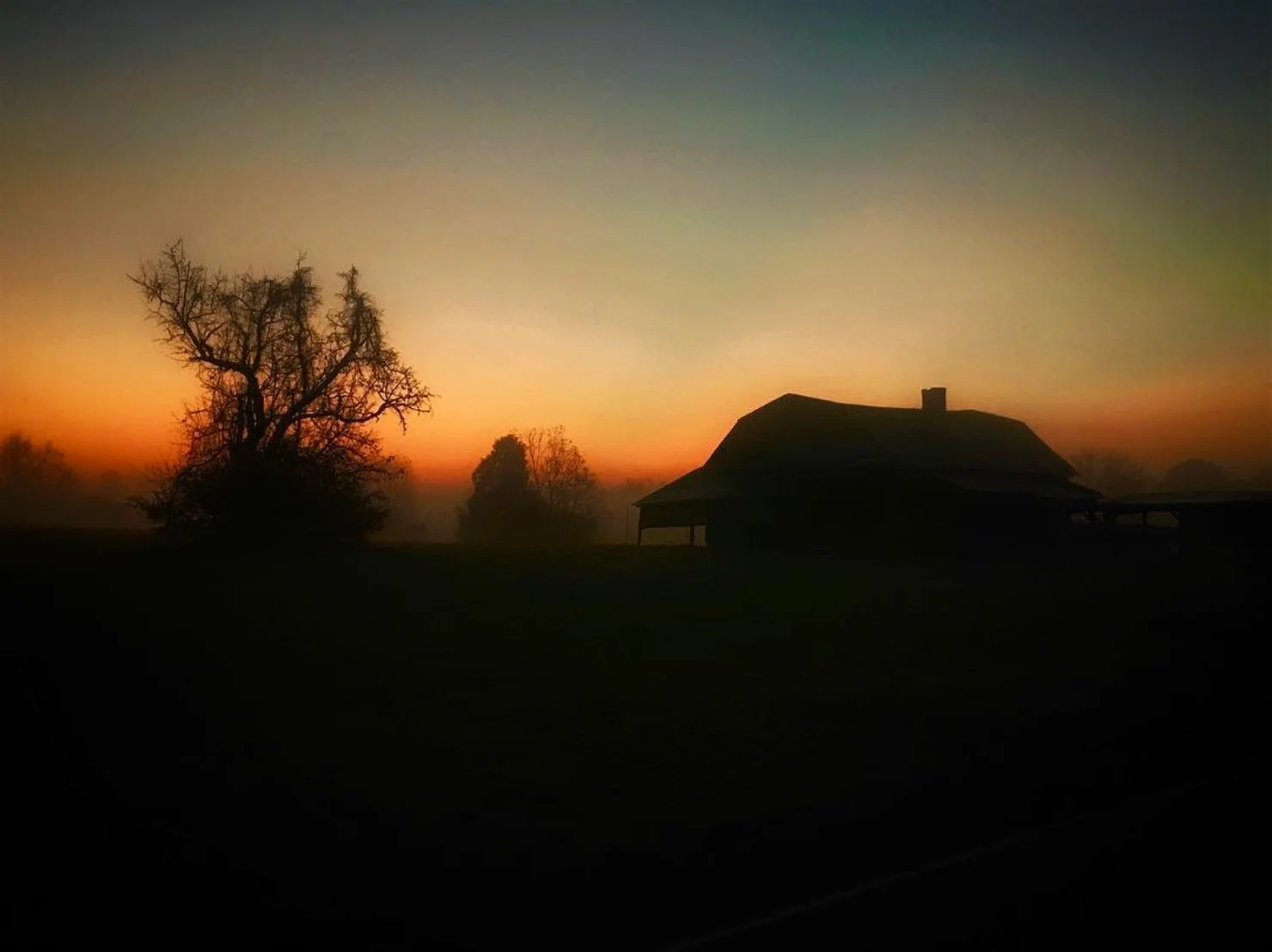 Farmhouse at sunset in rural Western North Carolina
