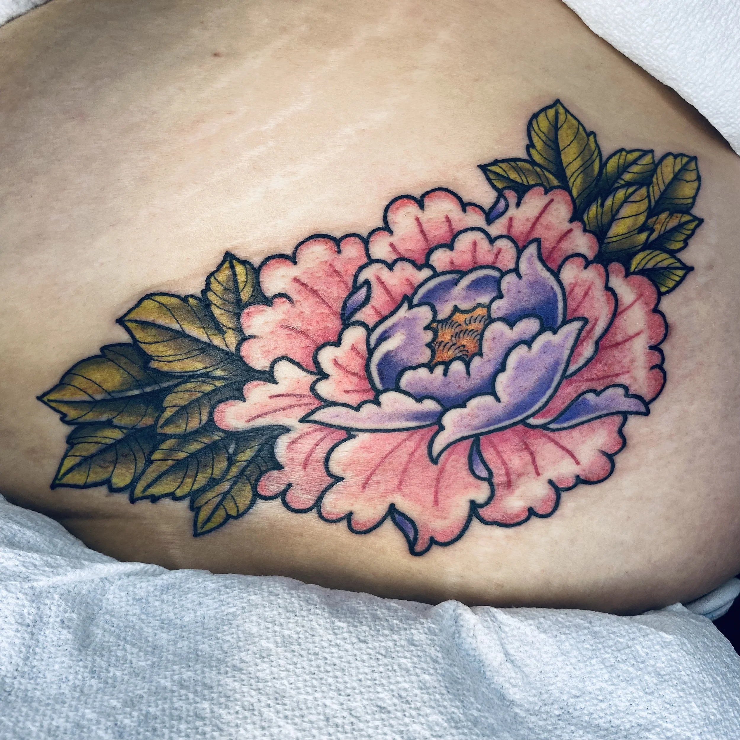 Blooming with Beauty: A Japanese Peony Cover-up Tattoo Story