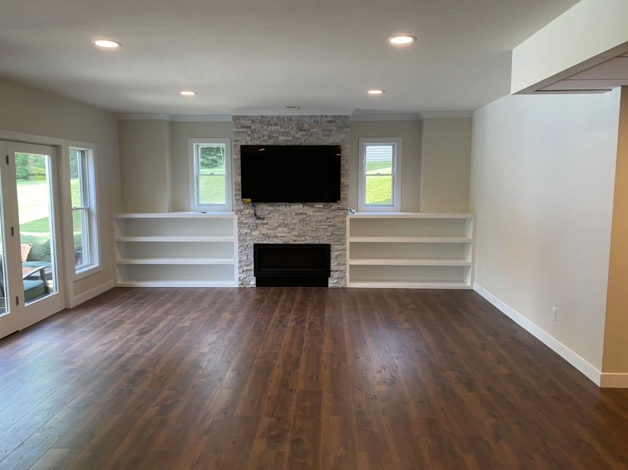 Sonneman Basement remodel_fireplace and bookcase_IMG_9134.jpg