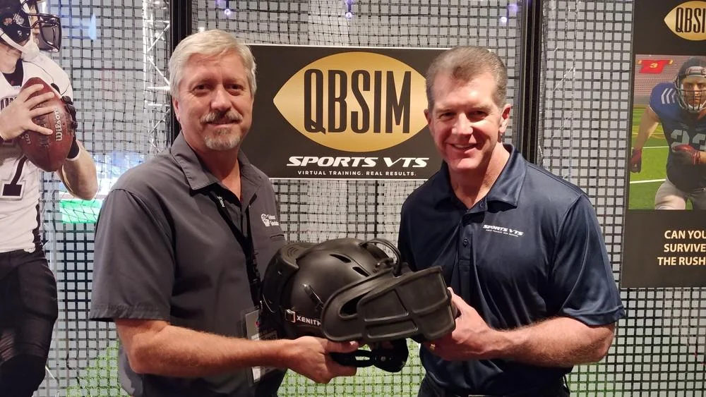 Serious Simulations CEO Chris Chambers, left, poses with Sports VTS CEO Ted Sundquist.