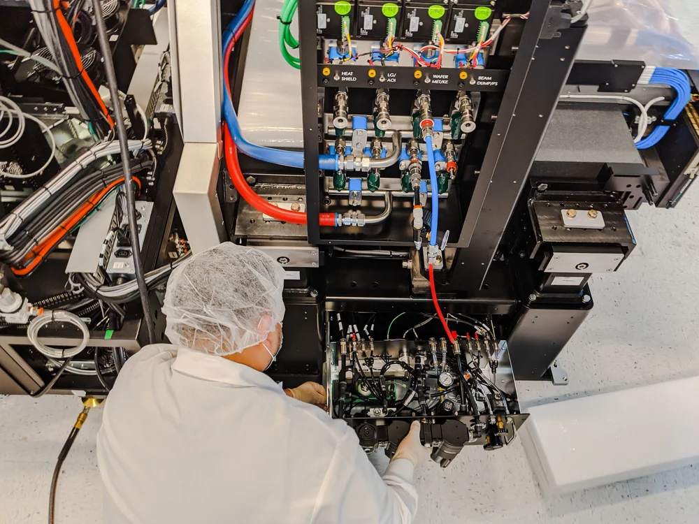Technician wiring a complex system