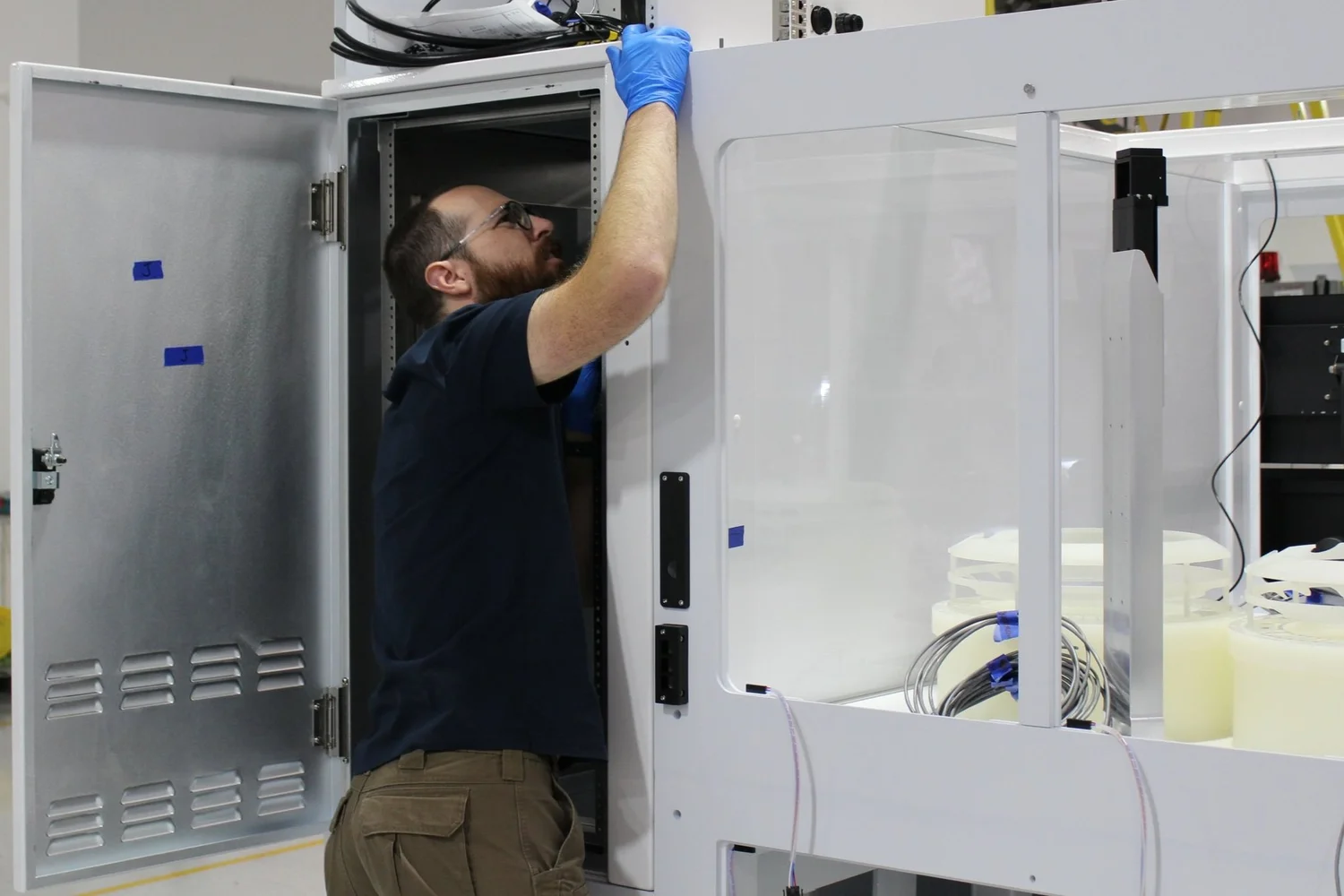 Applied Engineering technician integrating a semiconductor equipment frame