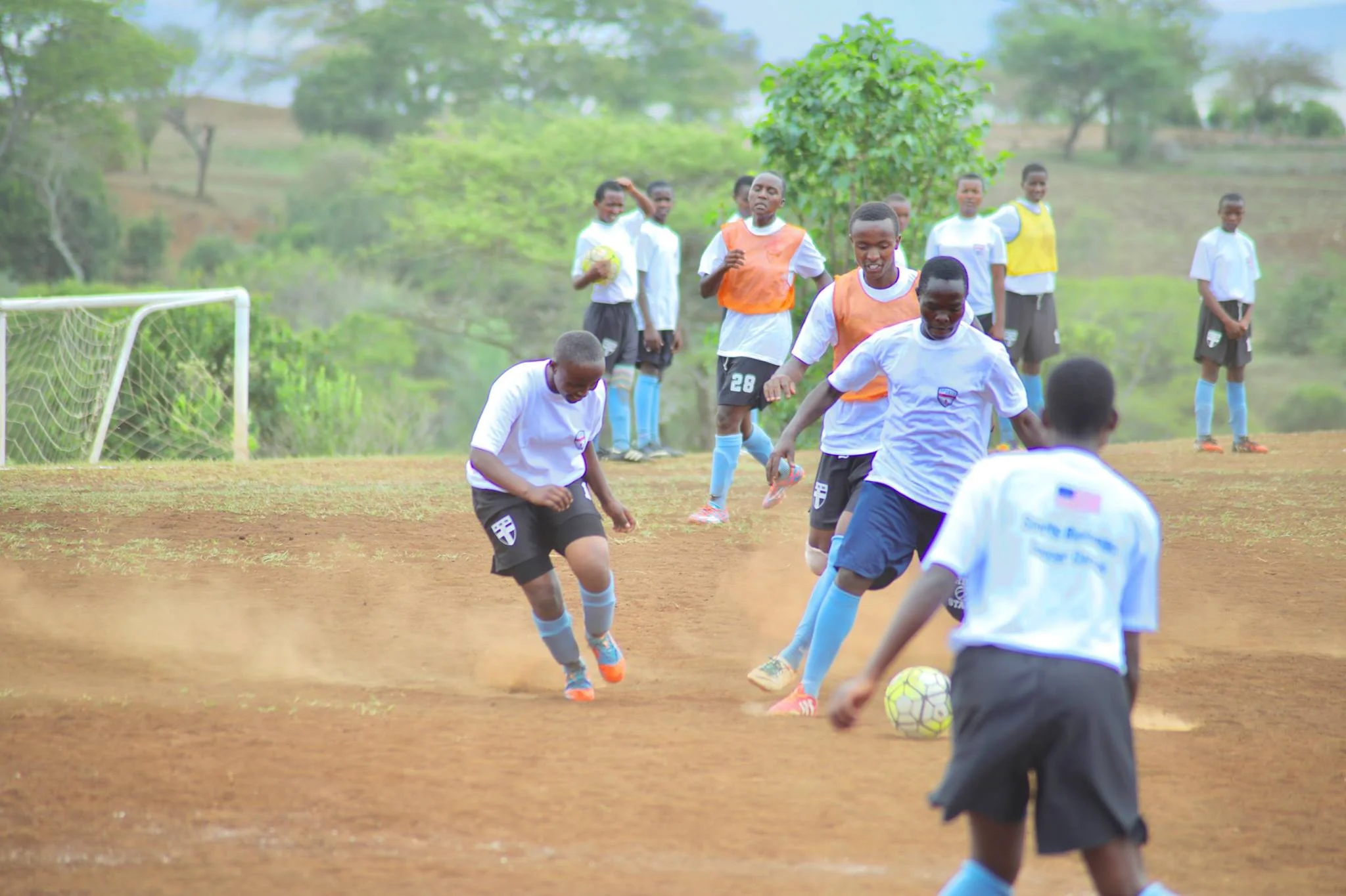 Tanzanian youth participate in soccer drills lead by Sports Envoys and U.S. Women’s National Team member, Alex Morgan, and Orlando City player Servando Carrasco. 2017. 