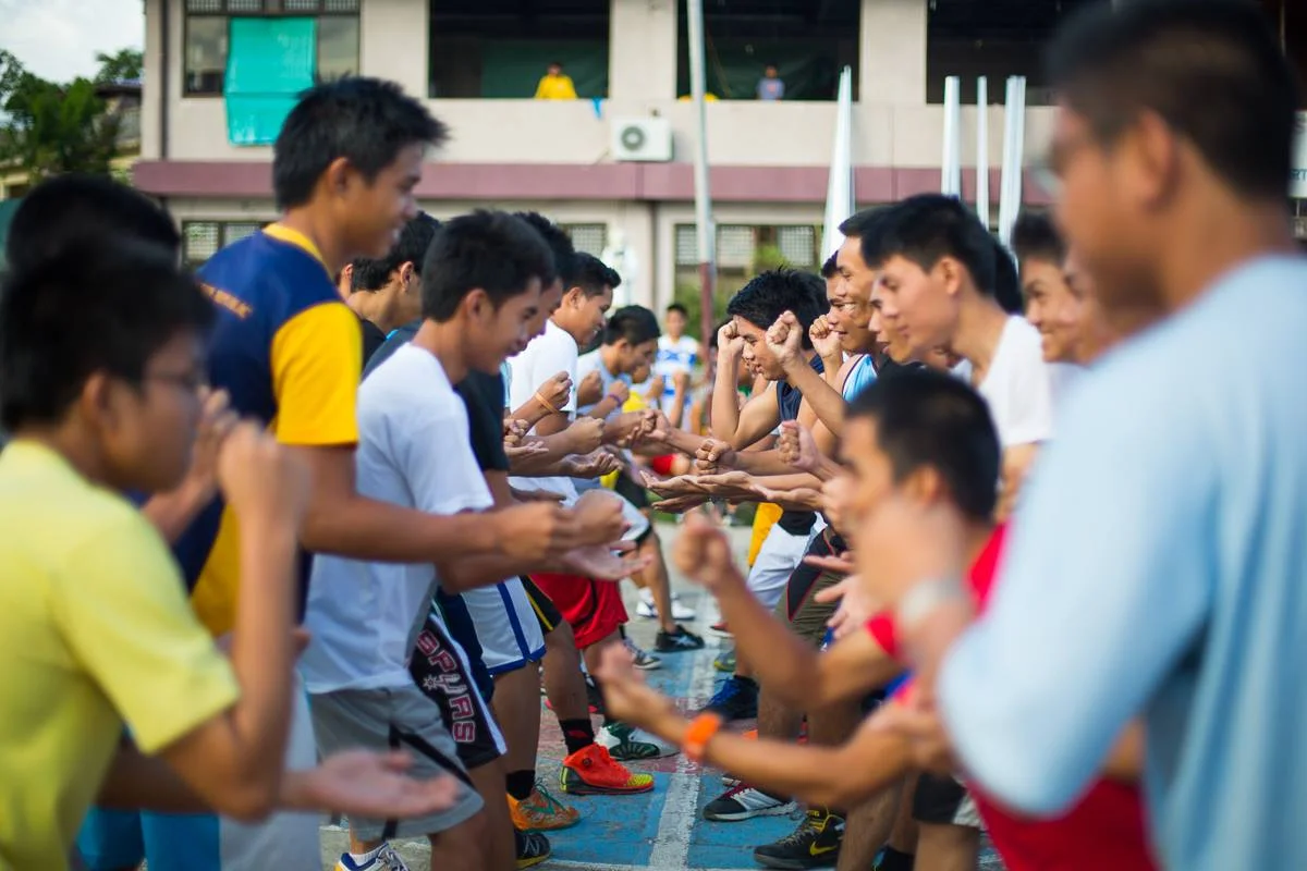 Youth in the Philippines face-off during a sports clinic lead by Global Sports Mentoring Program alum Geraldine Bernardo. Photo courtesy of Center for Sport, Peace, and Society at the University of Tennessee. 2014.