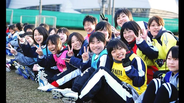 Soccer clinic participants in Japan after session with USWNT in 2013.