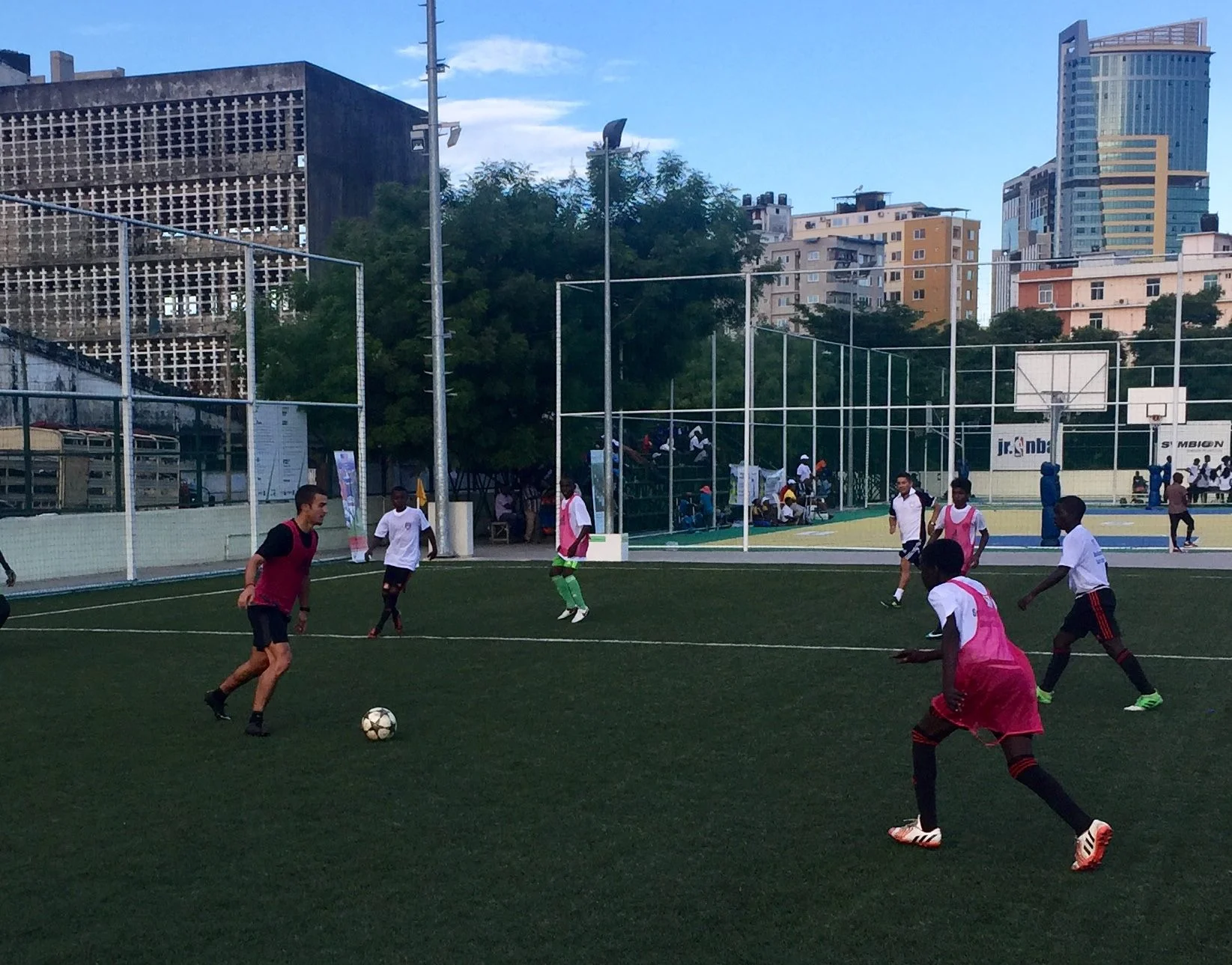 Sports Envoy and Orlando City player Servando Carrasco leads youth in a scrimmage in Tanzania. 2017. 
