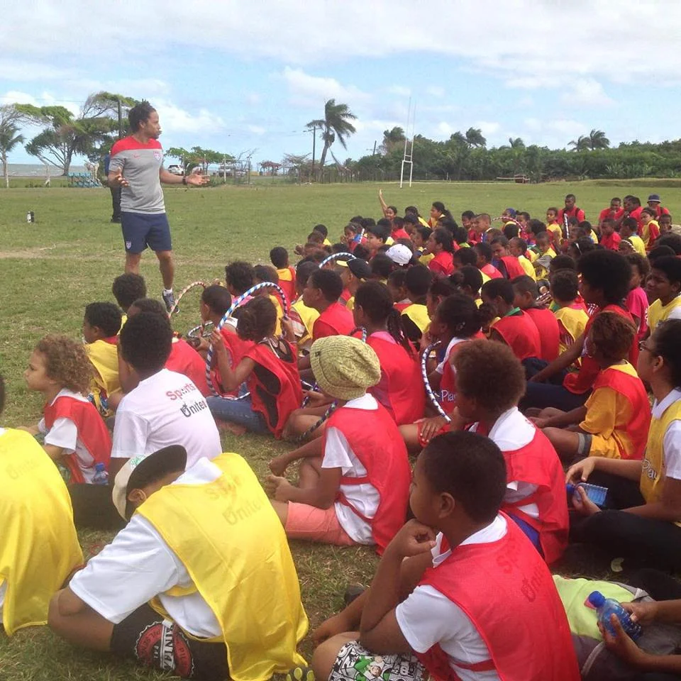 Sports Envoy and former U.S. Men’s National Team member Cobi Jones engages with youth in Fiji. 2015. 
