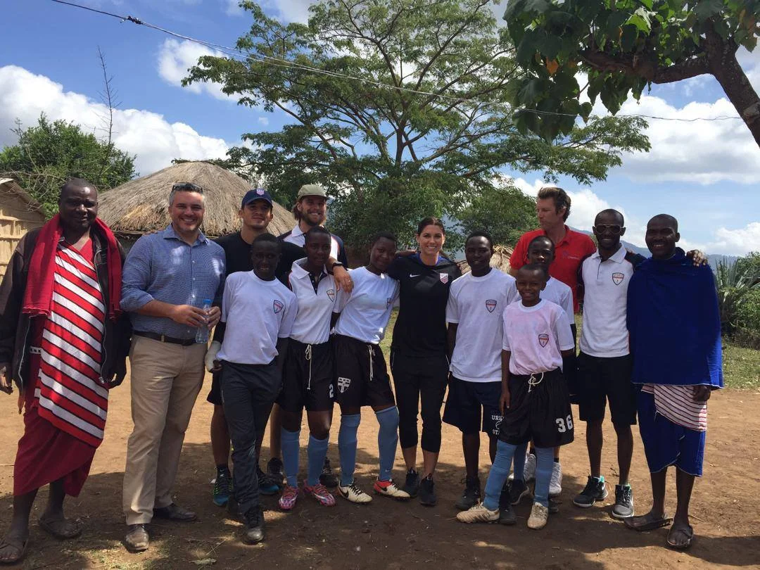 Sports Envoys and U.S. Women’s National Team member, Alex Morgan, and Orlando City player Servando Carrasco engage with youth and community leaders in Tanzania. 2017. 