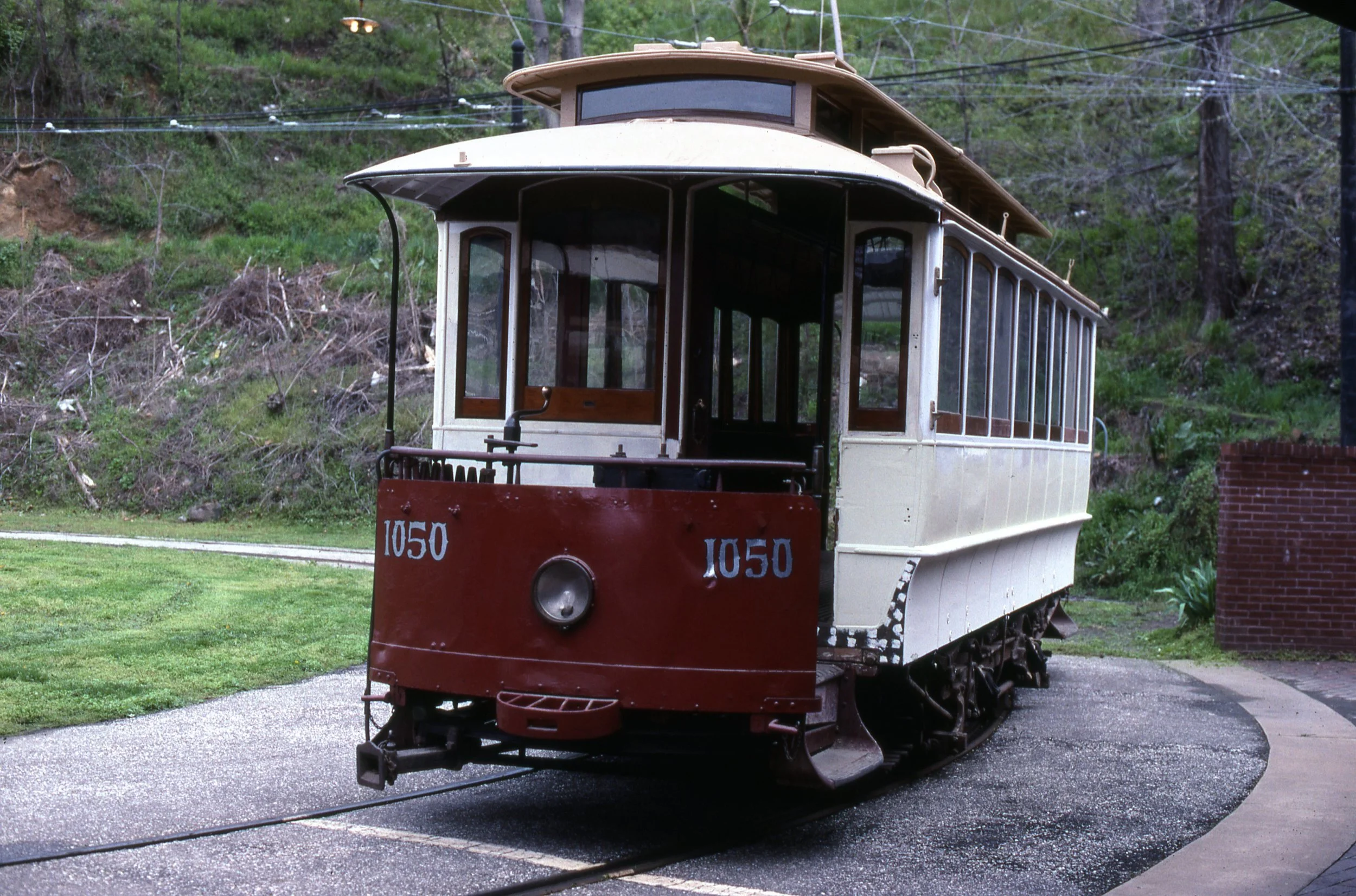 Car 1050, Year 1898 Image Credit: Henry Riecks, Maryland Rail Heritage Library Built by Brownell for the Baltimore Consolidated Railway Company, this car is very similar to No. 417, except that it is 5.5 feet longer and was built from the beginning to operate by electric power. It could seat 28 patrons. The use of electricity provided a greater carrying capacity as evidenced by the larger number of passengers this vehicle could accommodate. The single truck on this car is a good example of those built by the Baltimore Car Wheel Company and sold under the trade name “Lord Baltimore Truck.” Four of the Museum’s streetcars are equipped with this kind of truck. Fourteen cars of this series of 73 were converted to one-man operation between 1916-1921, serving until 1927. Another 27 cars were demotorized and used as trailers until 1921.