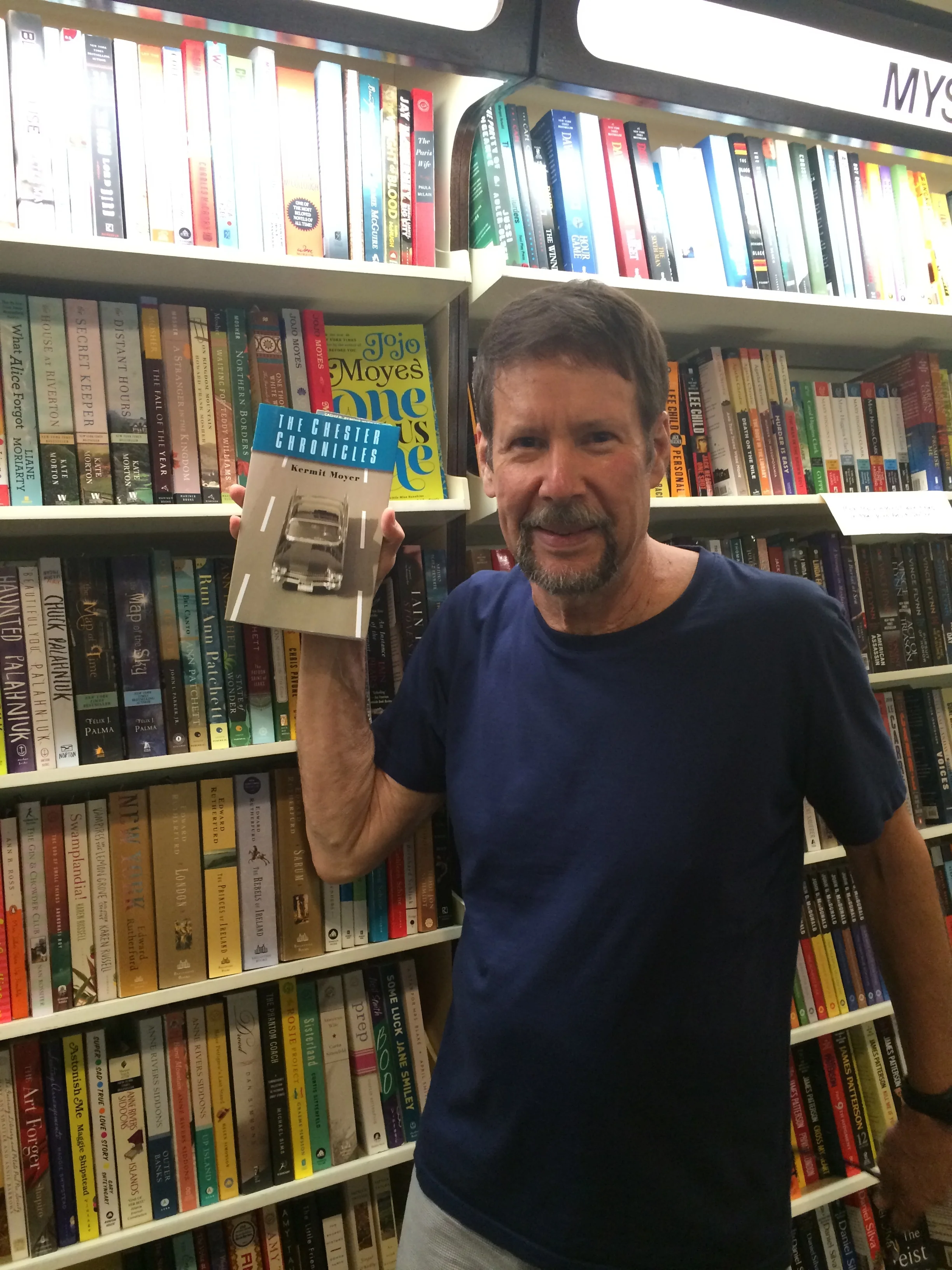 Finding my book at The Yellow Umbrella, a bookstore in Chatham, MA, 2013