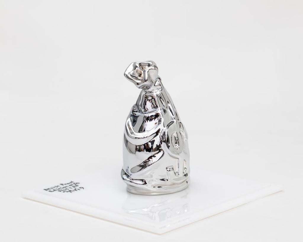 ZVG-S18049 Zevi G Art SECURE THE BAG chrome  Silver 6 inch Biodegradable Resin Sculpture 2018 7.JPG