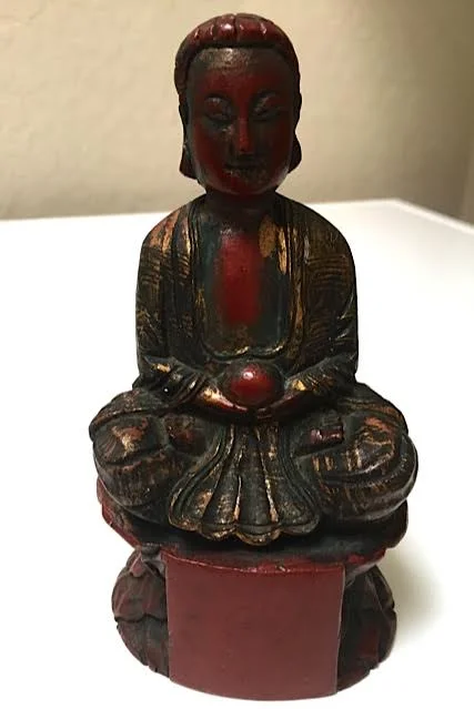 Carved wooden Buddha with gilt overlay