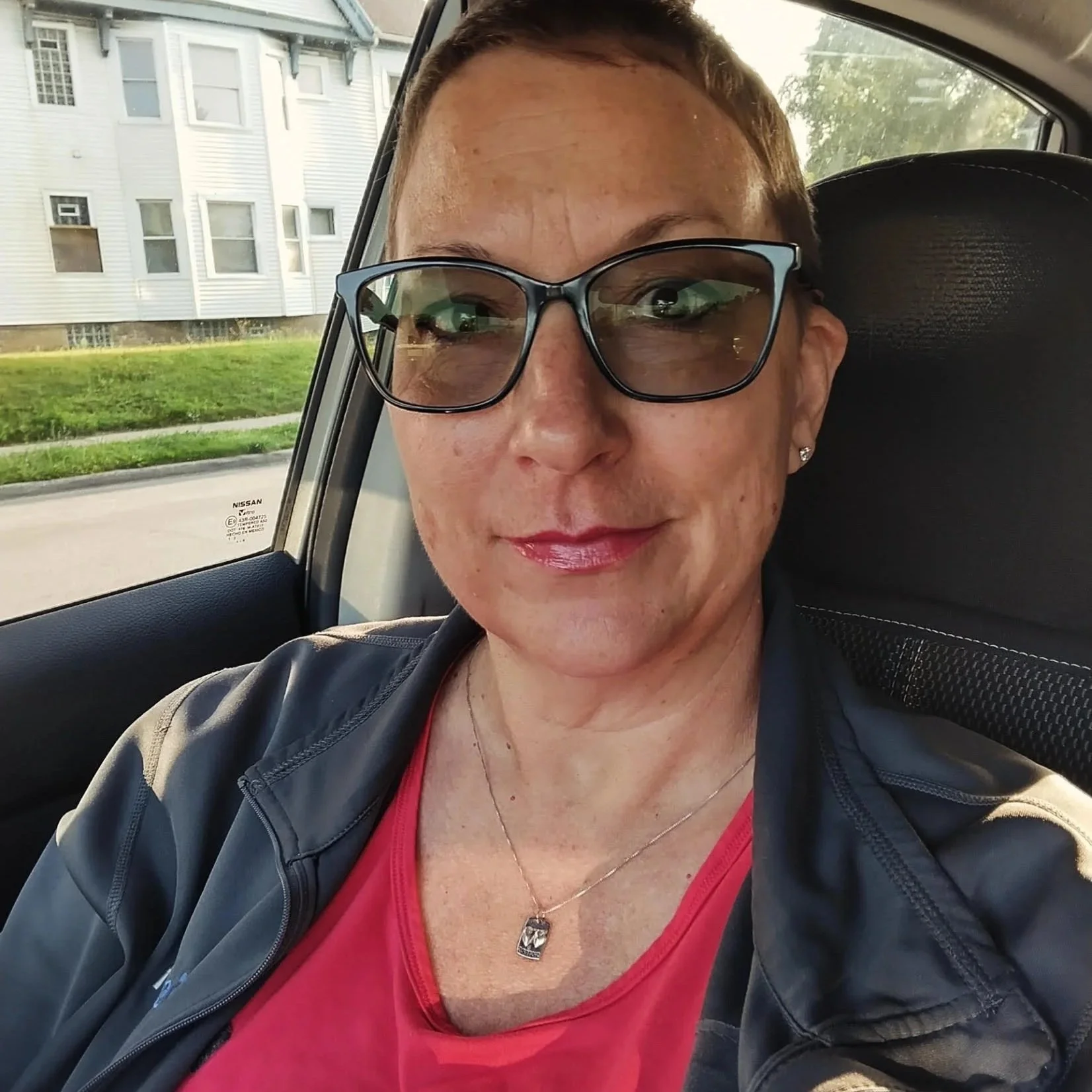 Experienced Milwaukee pet care professional from City Paws Pet Care traveling to a client's home for midday dog walking and puppy check-ins.