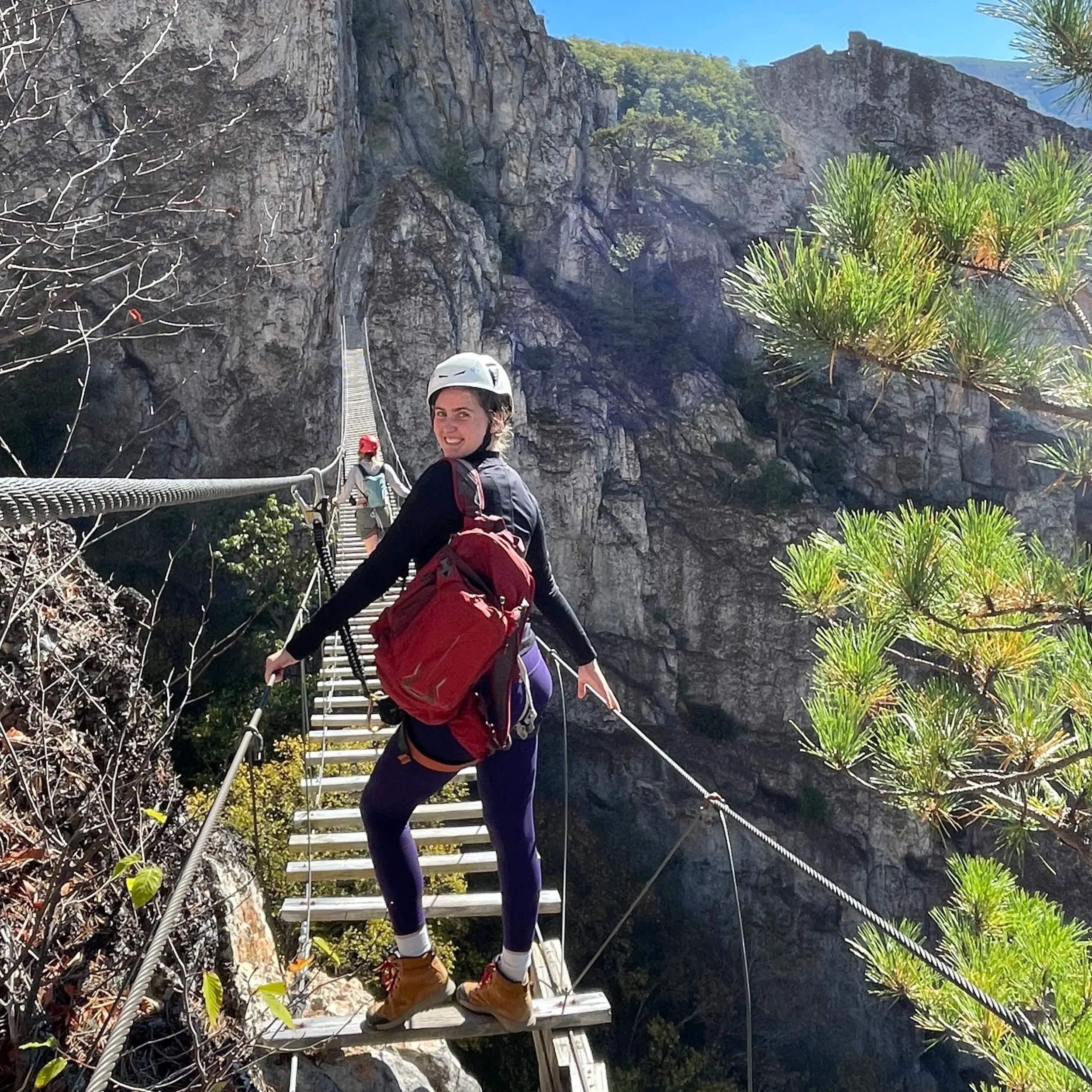 An active City Paws Pet Care professional hiking outdoors, showcasing the high-energy lifestyle our Madison and Milwaukee dog walkers bring to every pet visit.