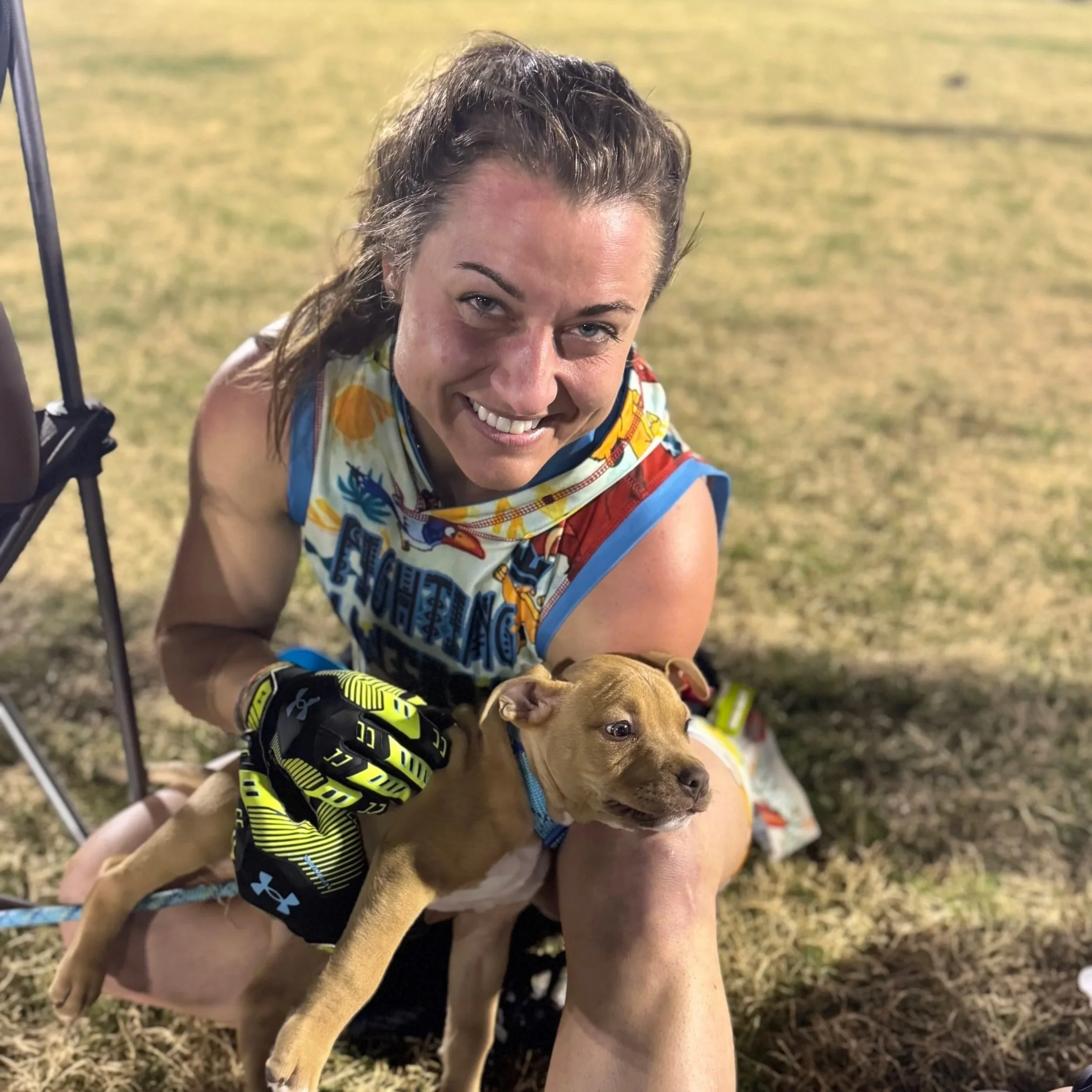 City Paws Pet Care sitter providing puppy care and outdoor exercise for a client’s dog in a local park.