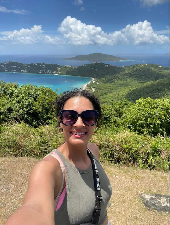 One of our trusted, active dog walkers from City Paws Pet Care enjoying a beautiful outdoor view, representing our commitment to adventurous pet sitting in Madison and Milwaukee.