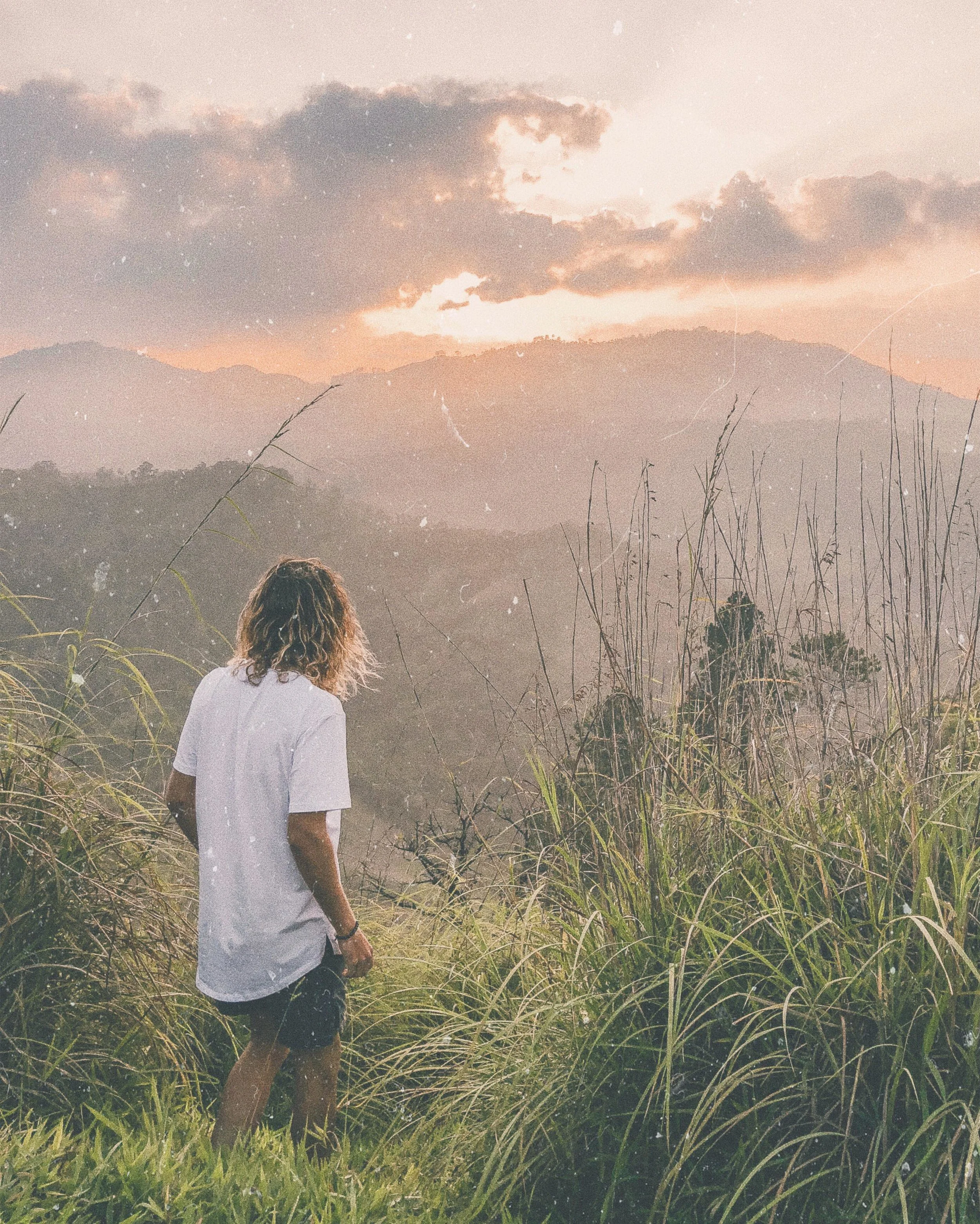 The moment the sun pierced the clouds at the top of Adam's Peak.