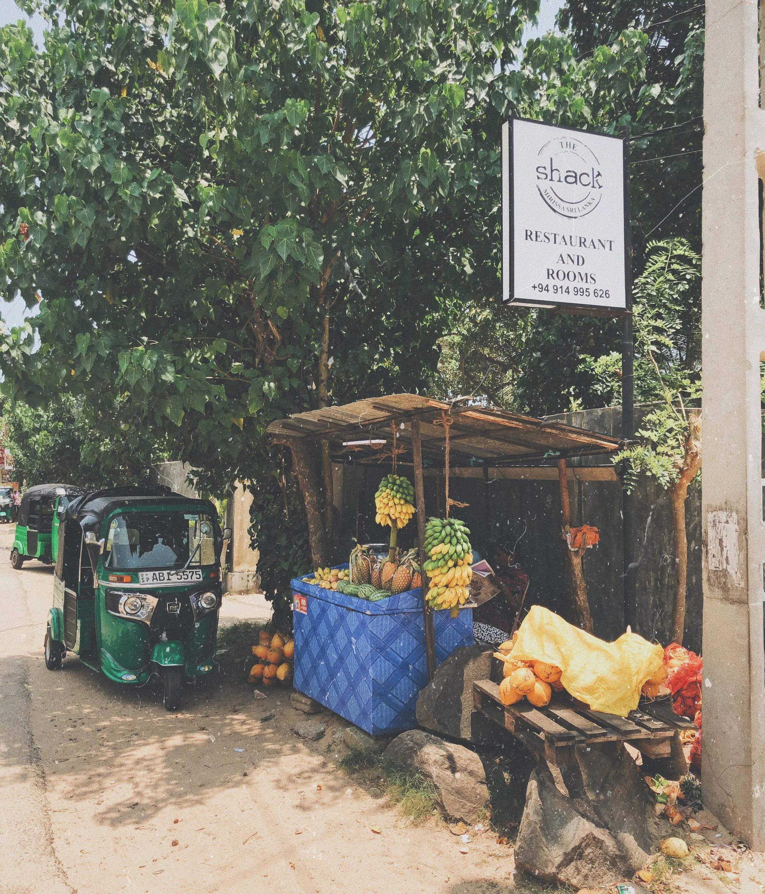 Street side fruit stalls, with colours popping left, right and centre.