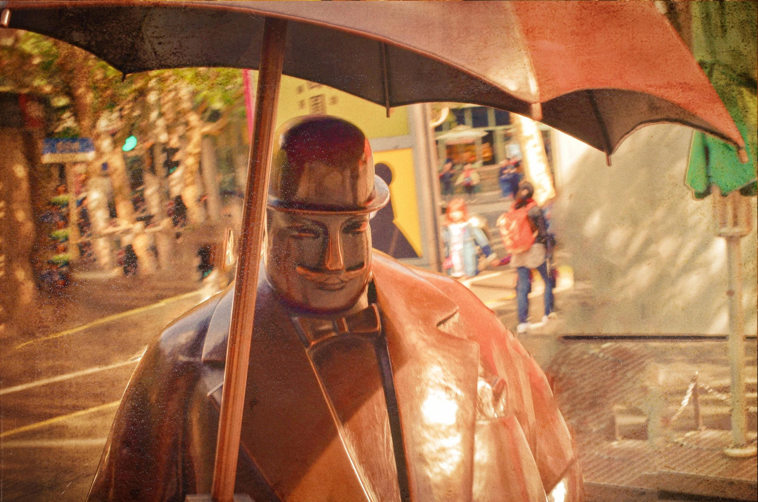 "BIG MAN WITH THE UMBRELLA"