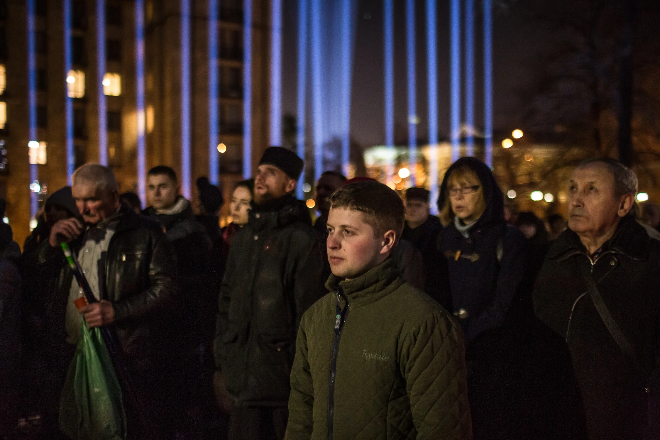 People came to the memorial displaying portraits of protesters killed during the Maidan protests on Instytutska street near Maidan Nezalezhnosti (Independence Square) in Kyiv, Ukraine on February 20, 2019. These beams of light, named "beams of dignity" are lit in memory of all those who died.