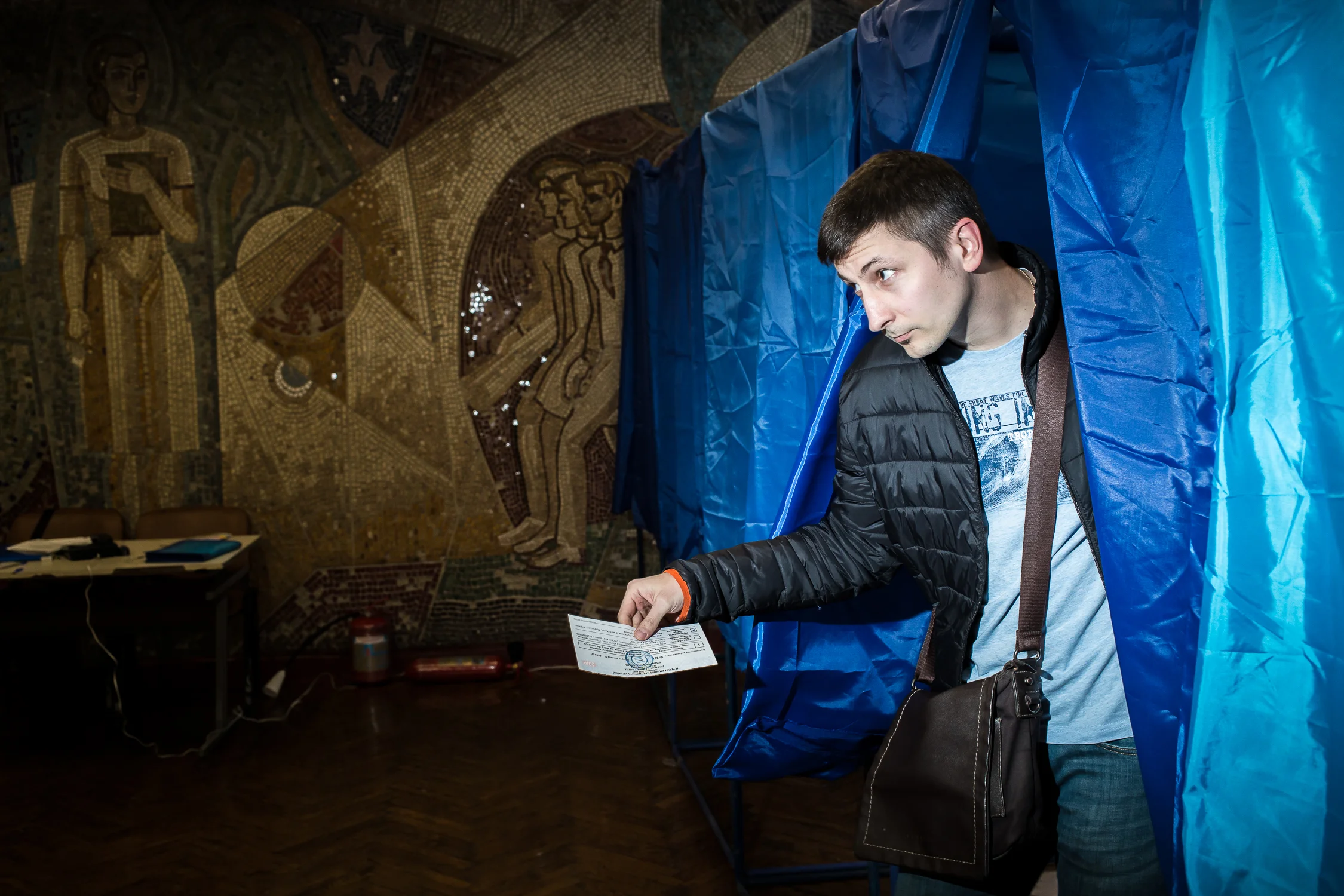 A man is leaving the voting booth at the second round of the presidential elections in Kyiv, Ukraine on April 21, 2019