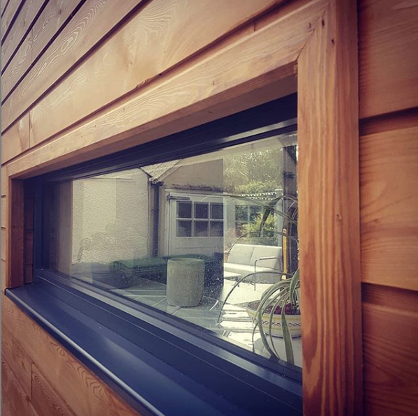 Modern larch cladded house extension.png