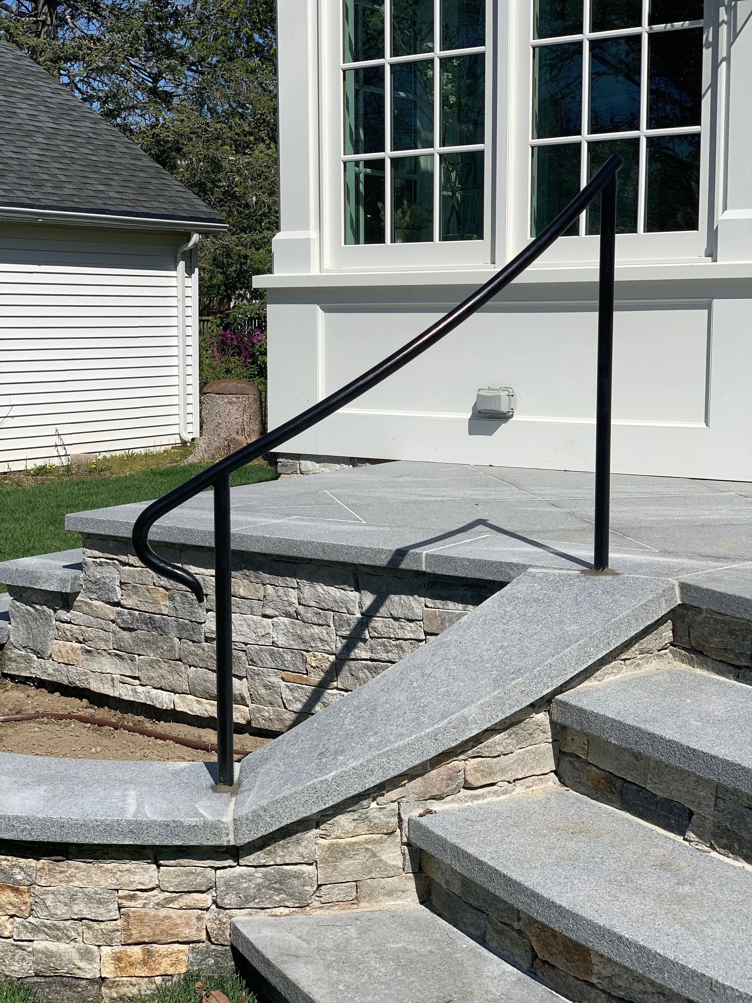 railing with sculpted bluestone.jpg