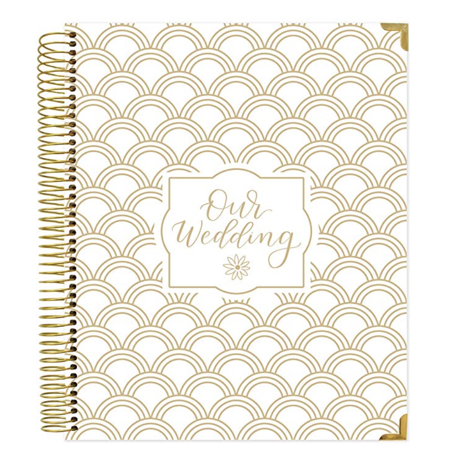 Wedding Planner - Apps and online notes are great, but sometimes you just want to write stuff down and keep it in one place. Enter the wedding planner. This spiral bound hardcover paper planner has spots for guest and vendor planning as well as monthly planning and areas to jot down your vision for your big day.